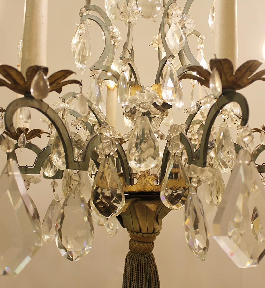 Crystal and bronze eight-light chandelier, 19th century.