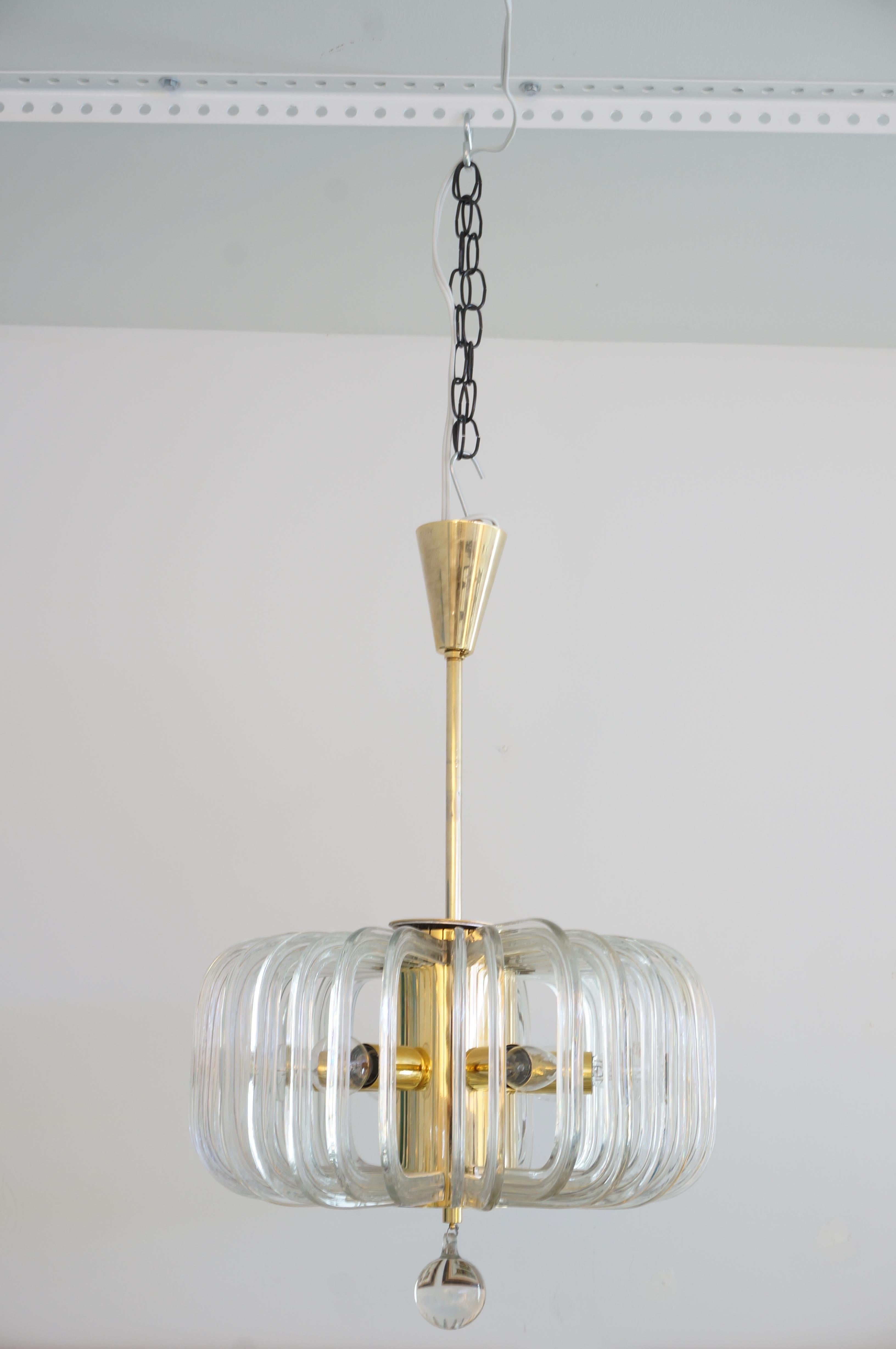 This stylish, chic and rare form Mid-Century Modern chandelier dates to the 1960s. The piece was designed by Cari Zalloni for Bakalowits & Shone of Vienna, Austria.

The quality of this piece is of the highest standards with its form, and use of