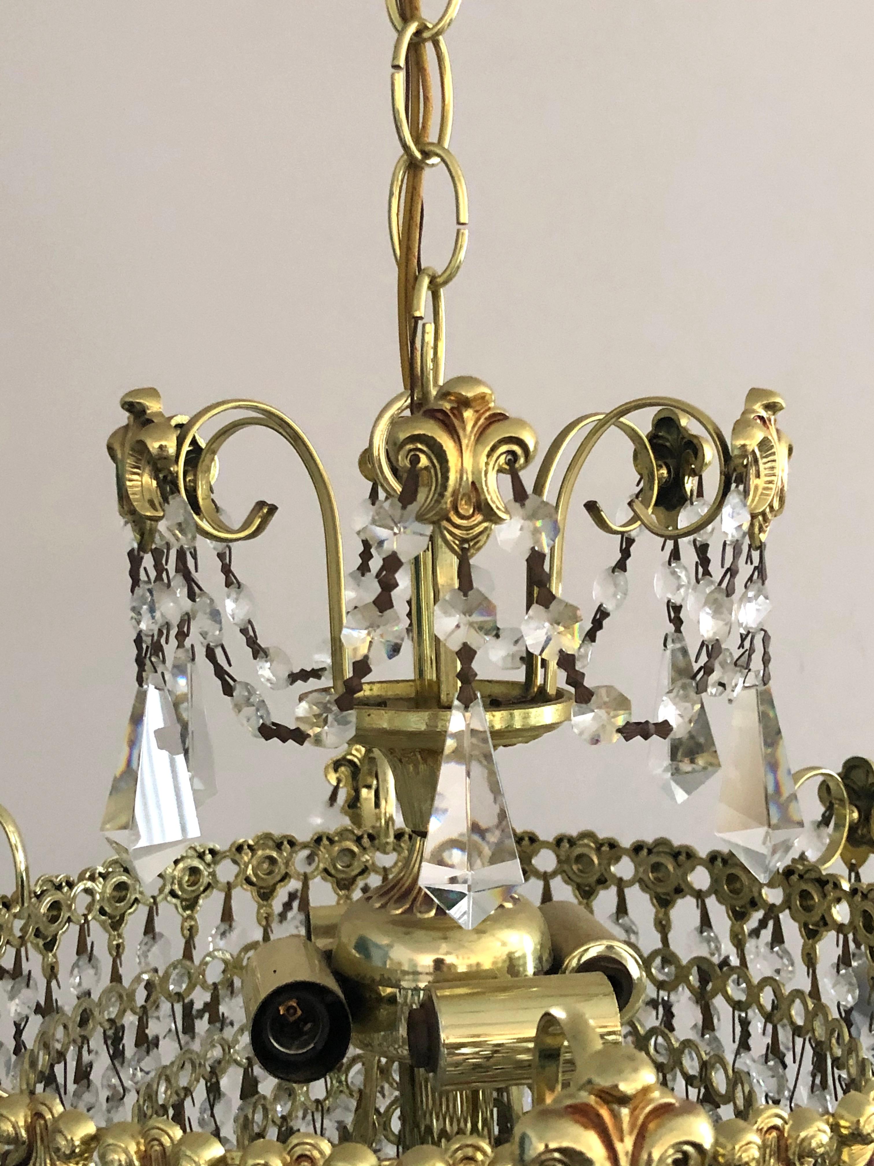 Unknown Crystal and Polished Brass Chandelier For Sale