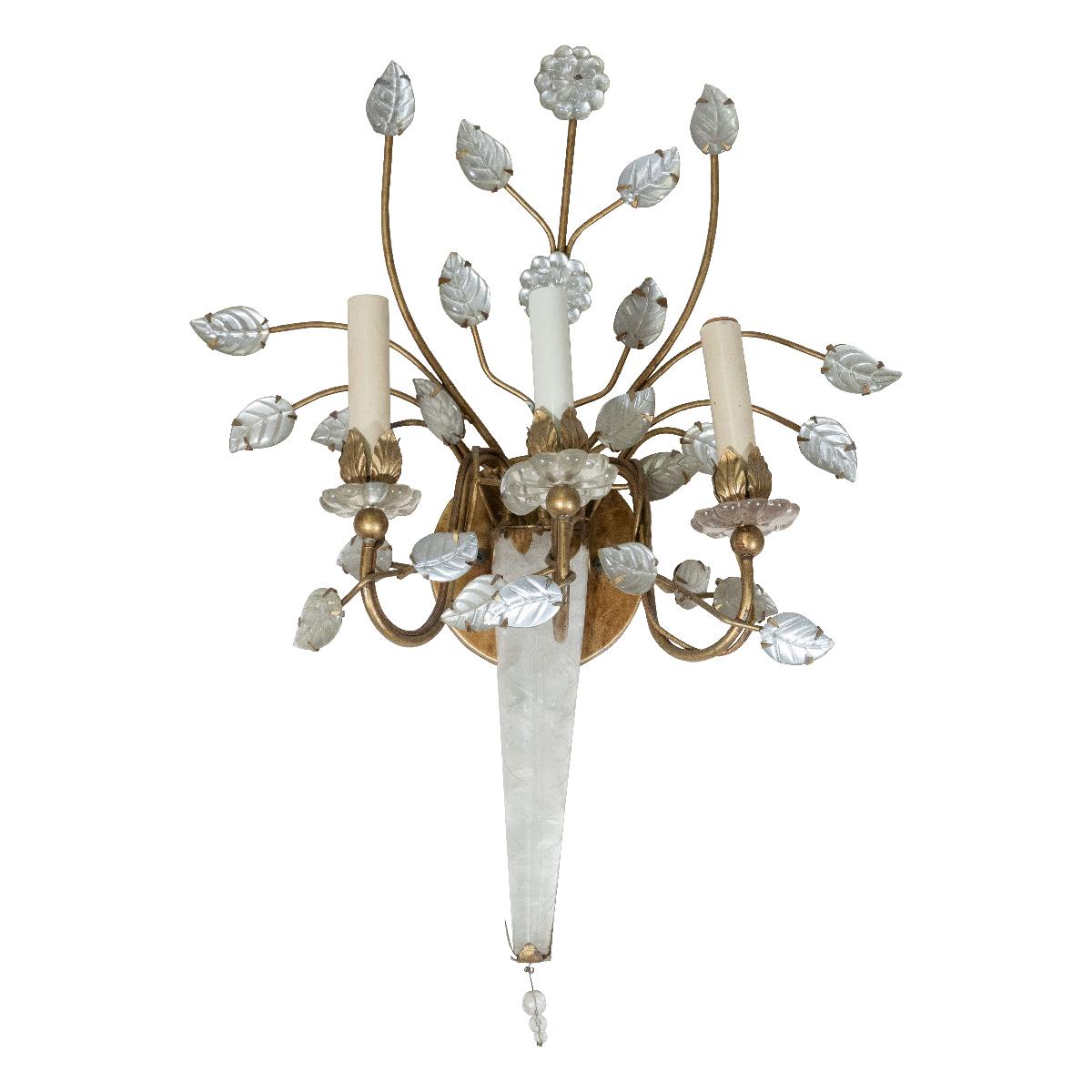 Single brass sconce with crystal and reverse silver leafed floral motif and rock crystal details in the style of Bagues.