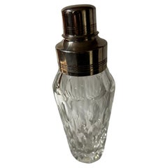 Shakers à cocktail avec couvercle en cristal et en argent