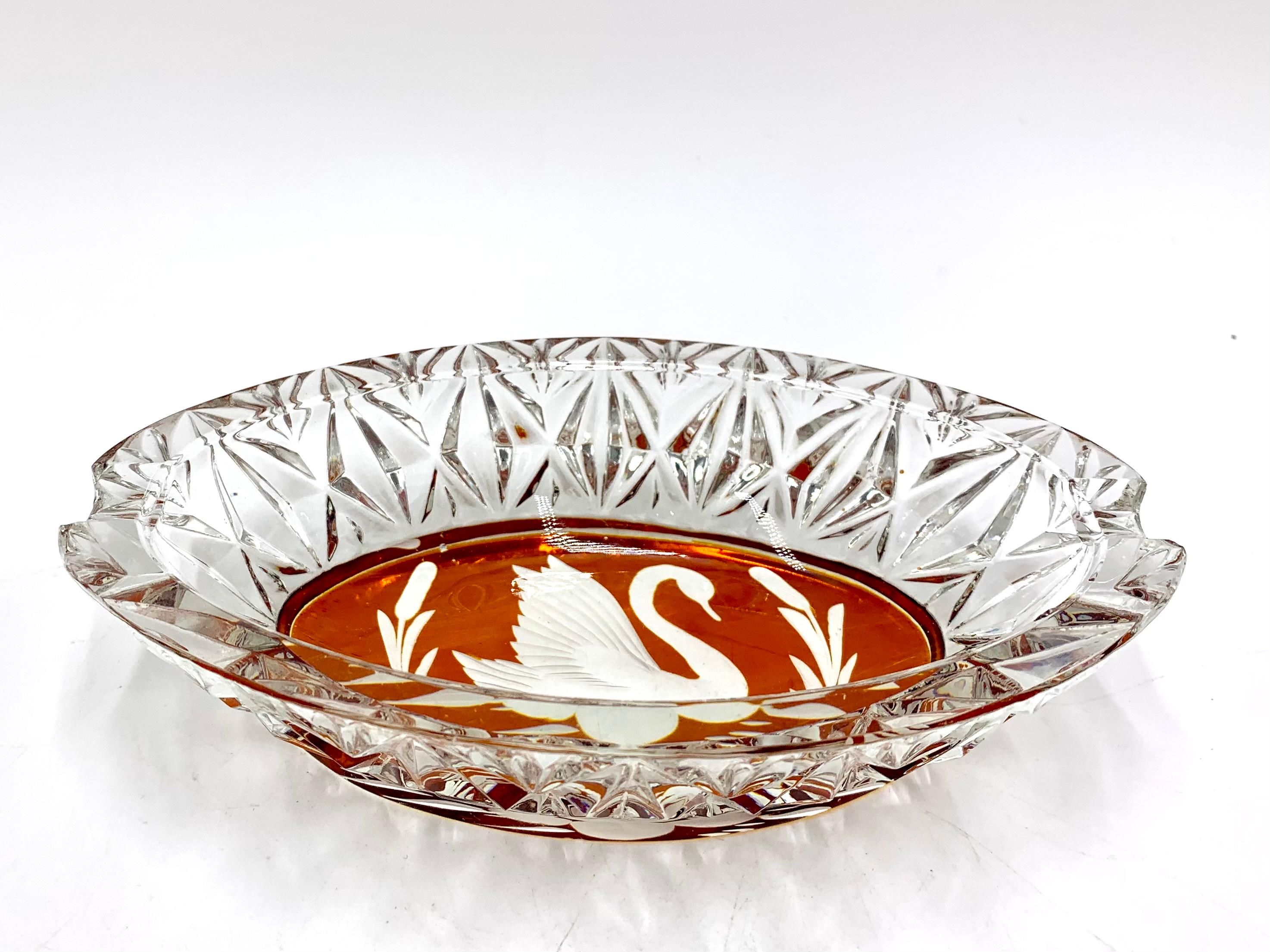 Vintage crystal ashtray

Produced in Poland in the 1960s by the Julia Glassworks

Very good condition

Measures: Height: 3.5cm

Width: 16cm.