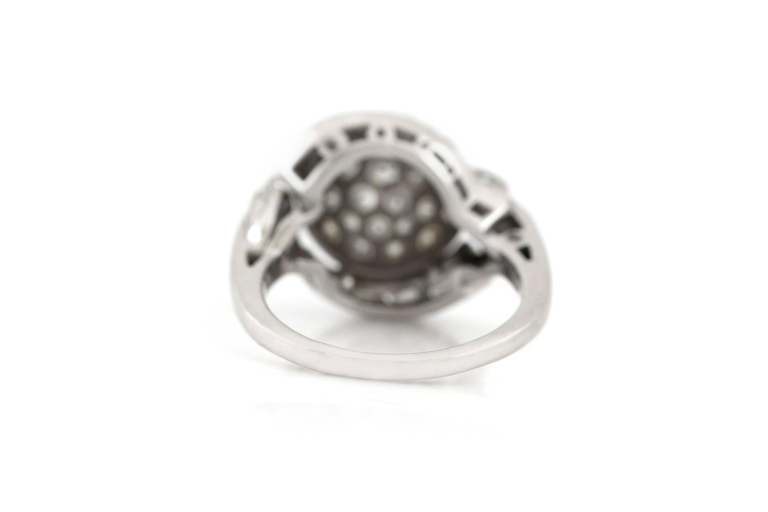 The ring is finely crafted in platinum and diamonds weighing approximately total of 3.00 carat.