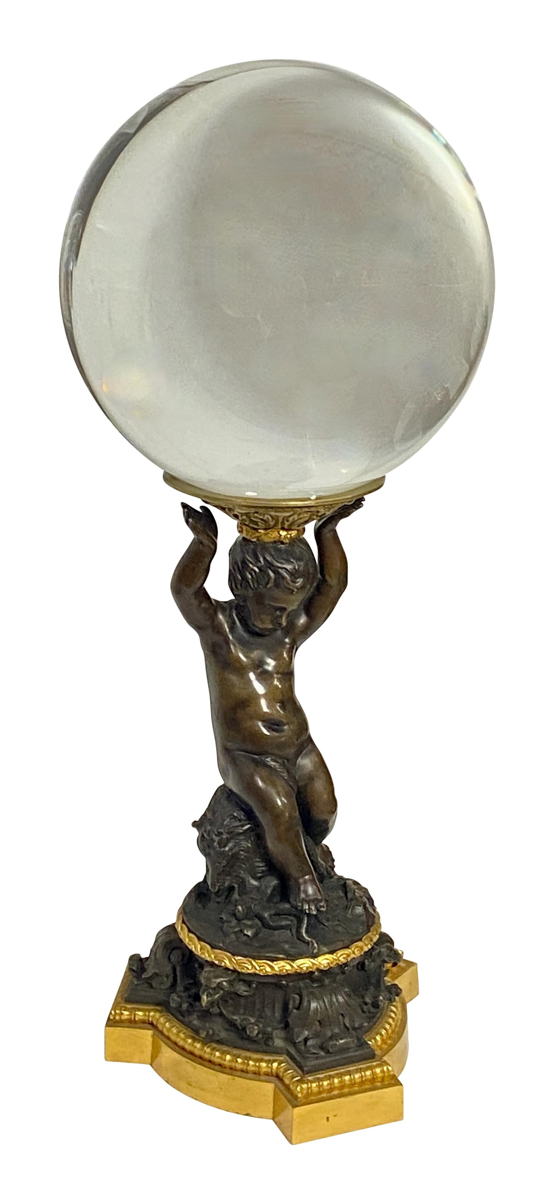 Gilt Crystal Ball on a 19th Century French Bronze Cherub Stand For Sale