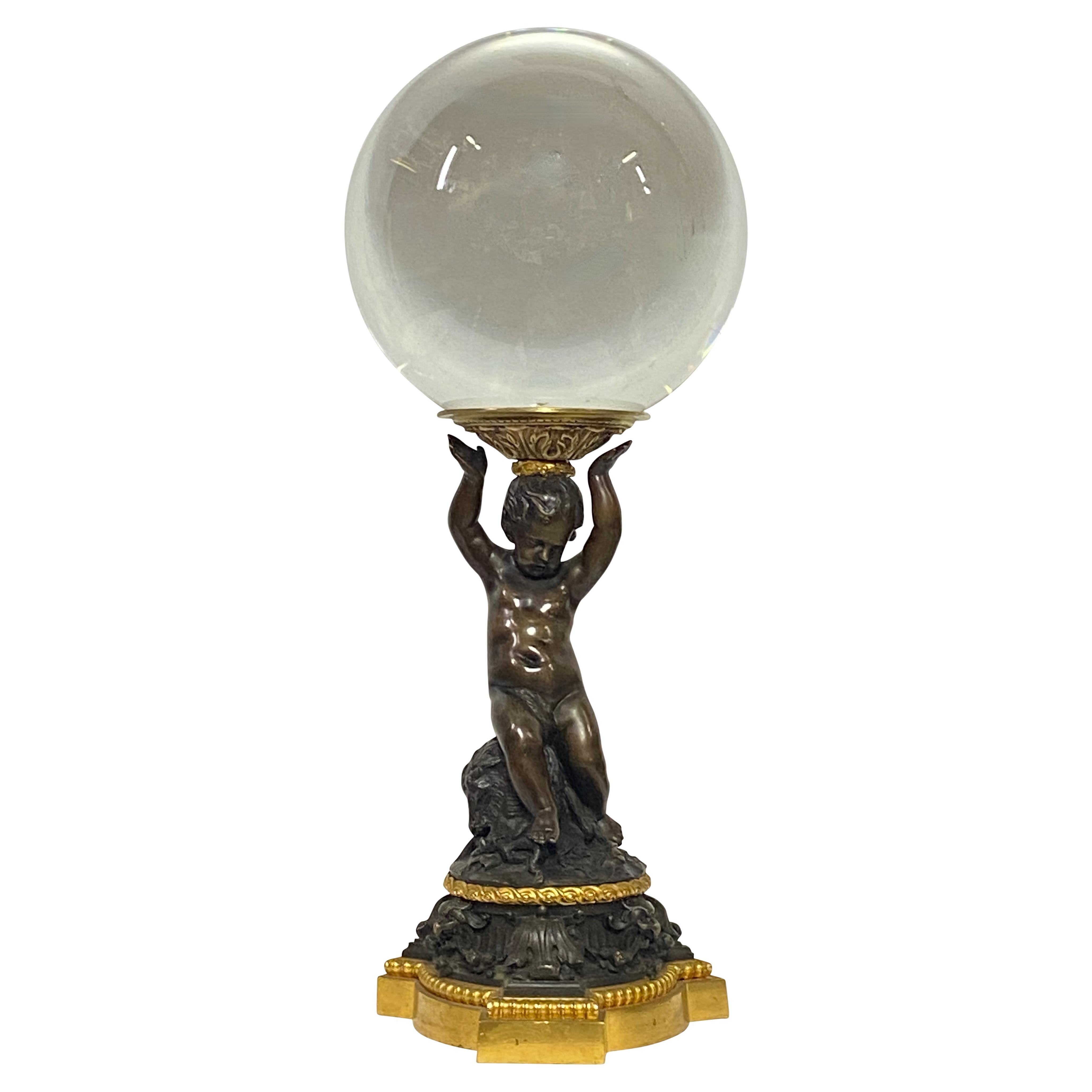 Crystal Ball on a 19th Century French Bronze Cherub Stand For Sale