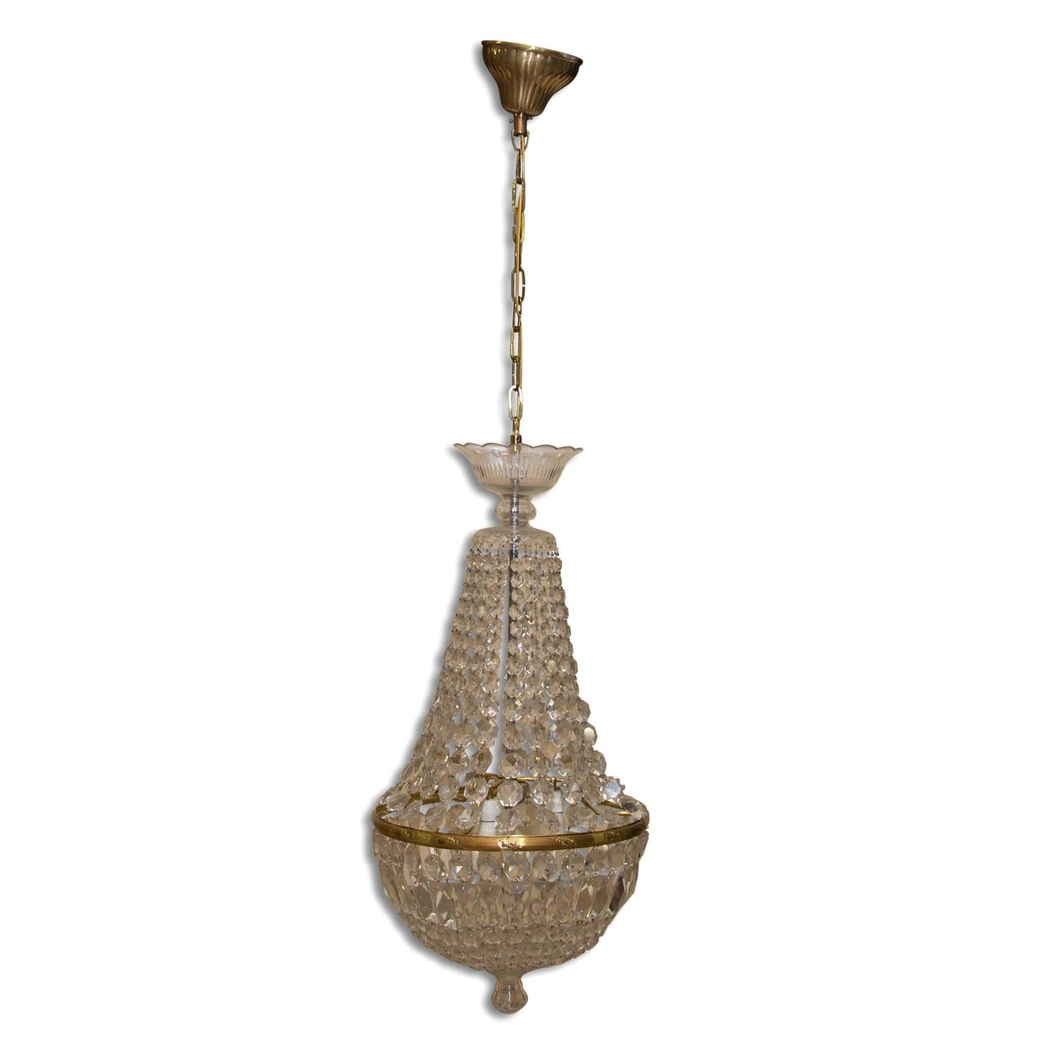 Beautiful crystal ball chandelier in the shape of pear produced in the 1940s in Czechoslovakia. It has new wiring. An excellent quality piece, it has a cut glass beads and pendants hanging from the brass centre. In very good Vintage condition,