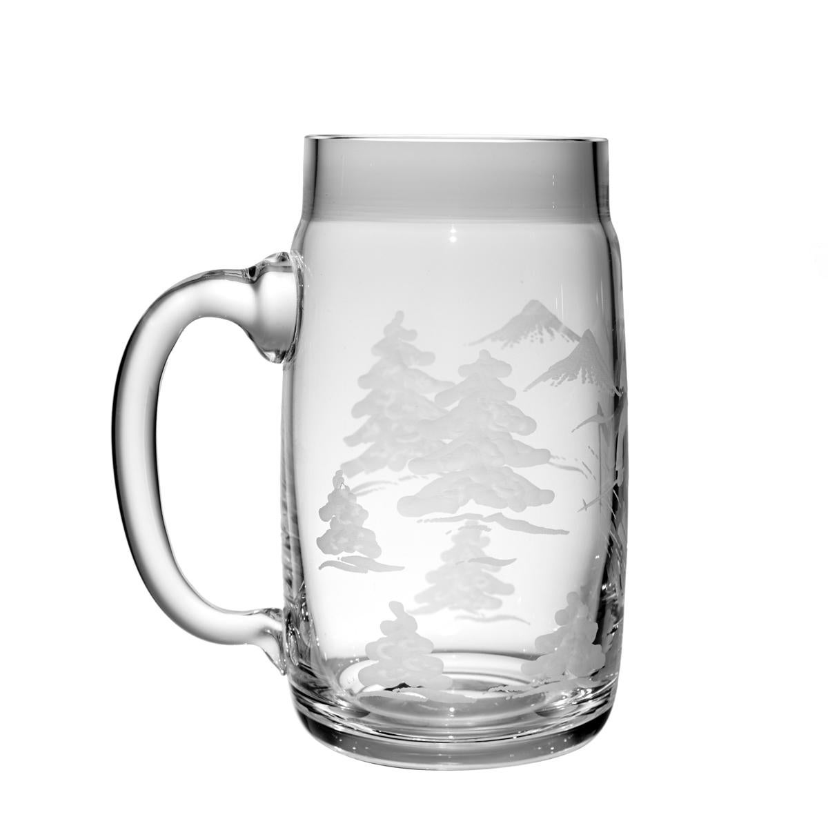Country Style beer glass called Bierseidl in clear crystal glass. Hand blown in Bavaria and hand-engraved with trees and a skier boy for 0.7 liter beer. Can be ordered also with six different hunting animals like gams Capricorn wild boar. Can be
