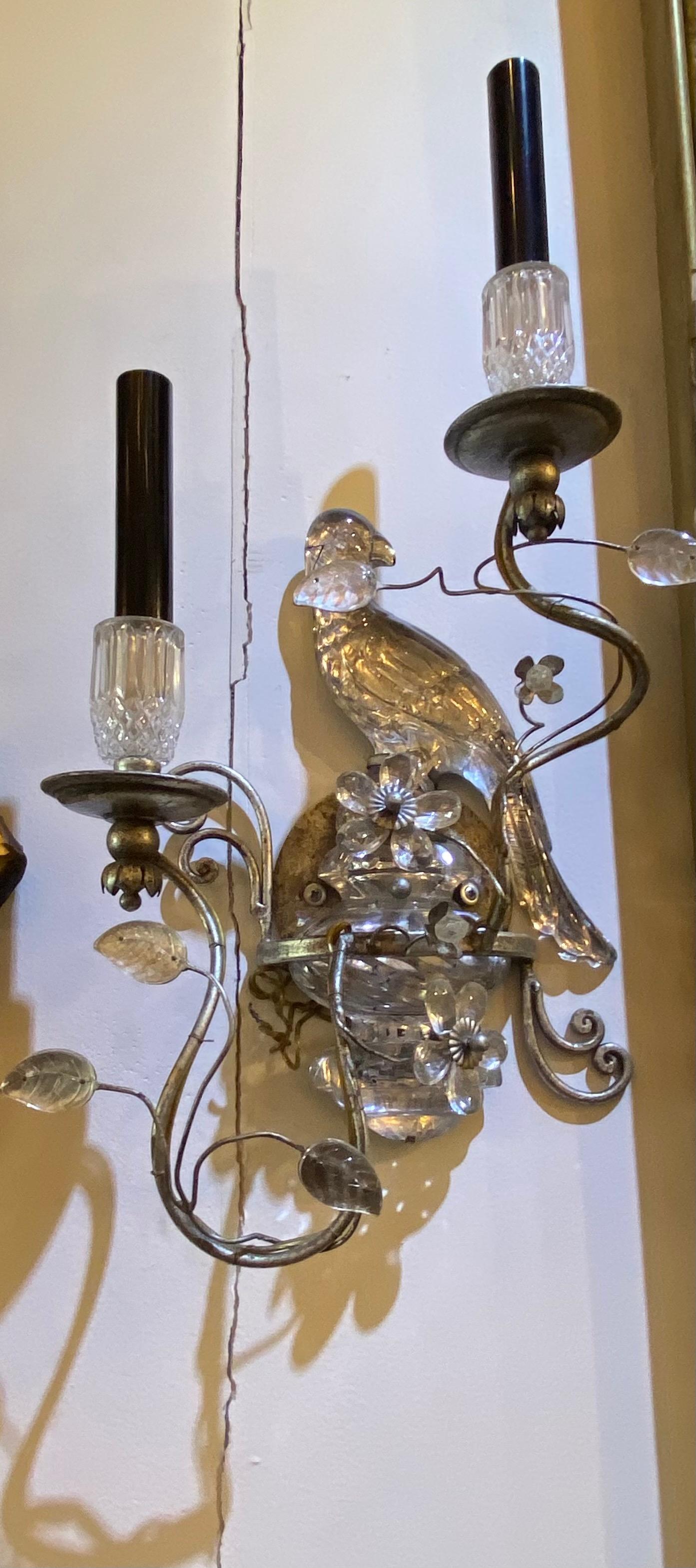 Pair of beautiful crystal bird sconces, with silver metal arms, 2 lights ea., crystal flower petals and unique silvers stile, circa 1990s.