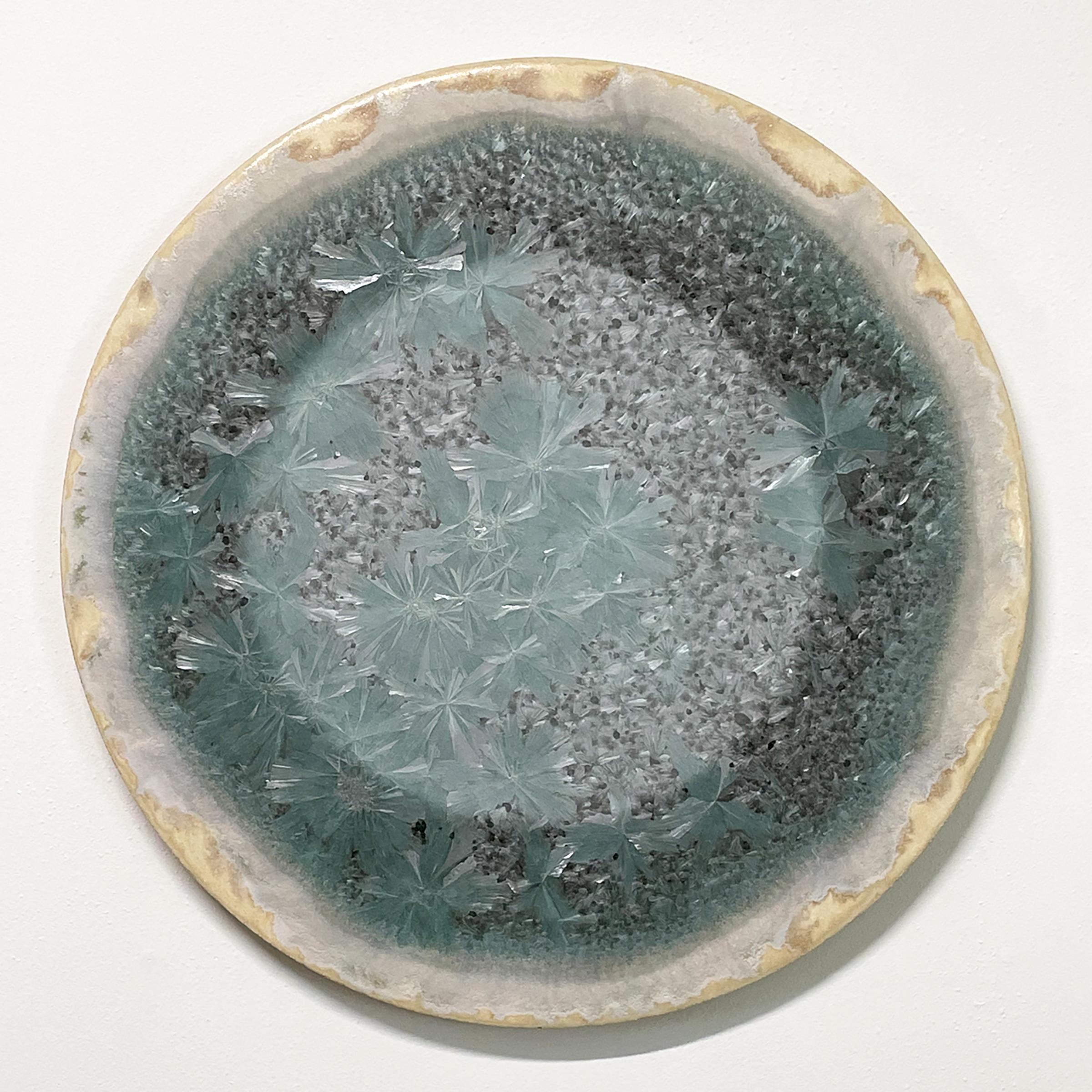 Crystal Blooms in the Moonlight
Ceramic crystal glaze painting by William Edwards
Hand rolled earthenware circular slab with crystal glaze. 

William received his BFA in sculpture from the historic San Francisco Art Institute and his MFA from UC