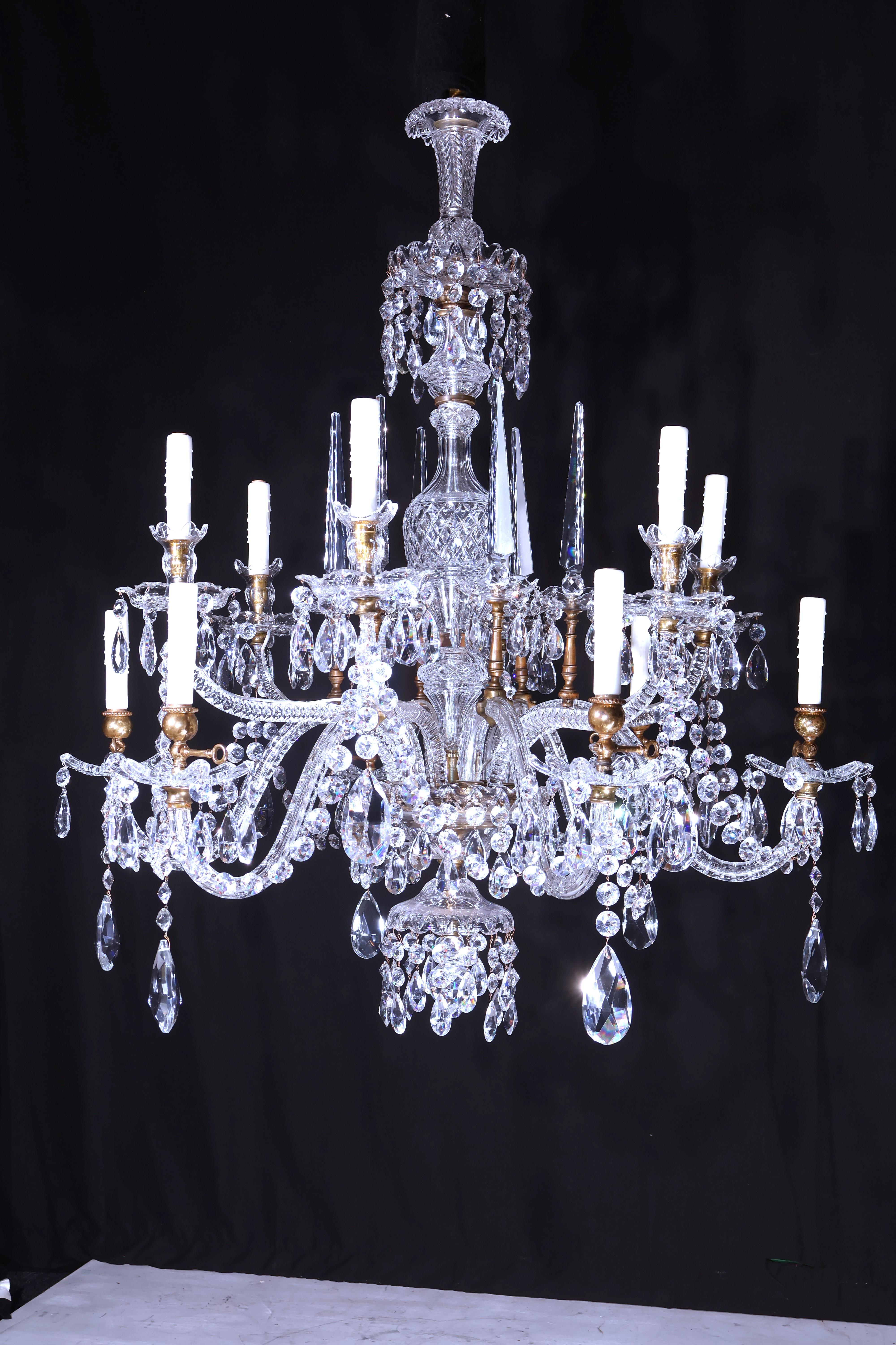 A Magnificent Bronze & Cut Crystal Chandelier, originally for gas and candles. Exquisite Quality. England, circa 1860. 12 lights. 
Dimensions: Height 48