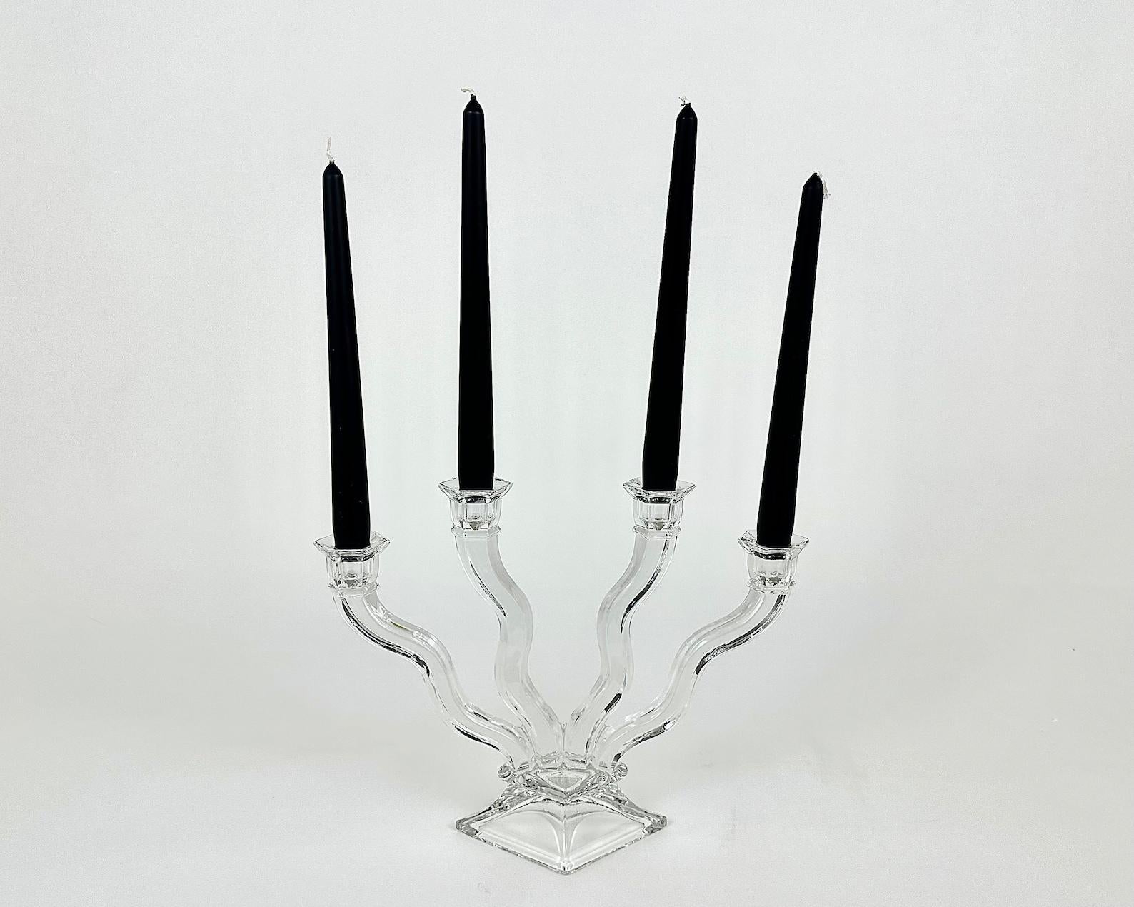 Beautiful Vintage Crystal Candelabra from the Famous German Manufactory NACHTMANN.

20th century.

Nachtmann existed since 1834.

Fine hand-cut.

Very beautiful in reality.

In excellent condition, no chips, cracks or crazing. 

 Size: 

13 inc  x 
