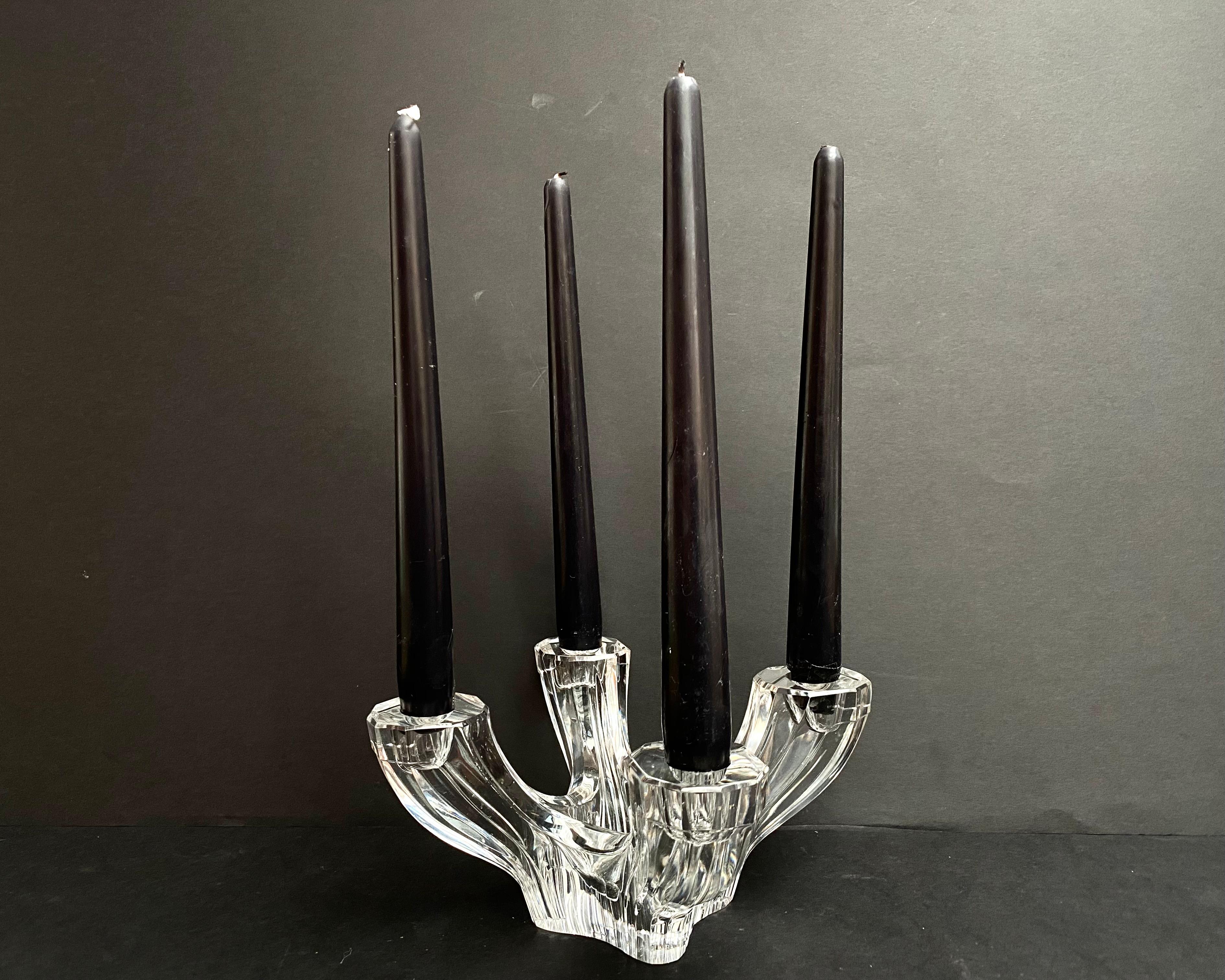 Beautiful candlestick made of transparent crystal, from Germany.  

Dating to the 60s of the 20 century.  

The candlesticks have an exclusive design, handmade, real high-quality lead crystal with a lead oxide content of at least 24%; this lead