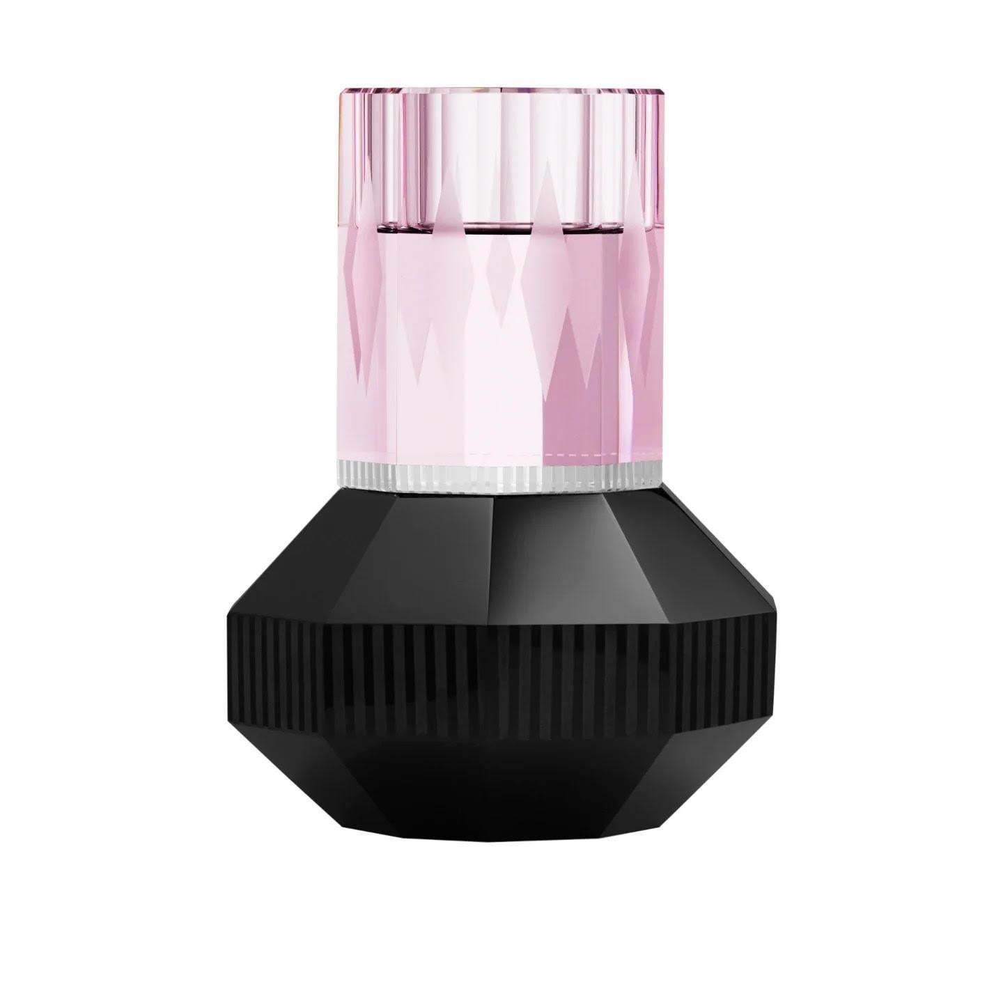 Crystal candleholder available in four colours: Yellow/Transparent/Violet, Pink/Yellow/Transparent, Blue/Amber/Cobalt and Pink/Transparent/Black. When the flames dance inside this candleholder, they reveal the magic of crystalline light, creating an