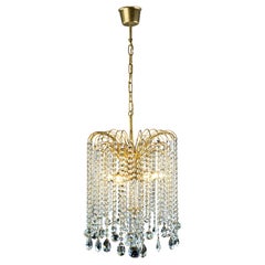 Lustre en cascade avec longues suspensions