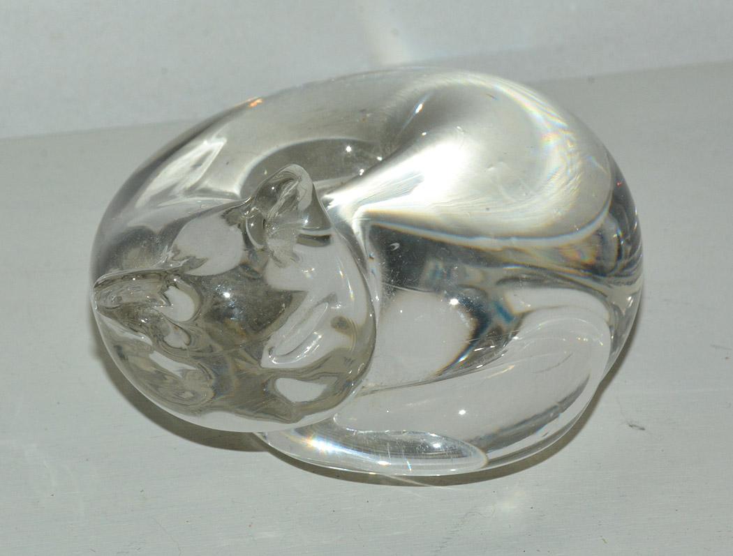 Wonderfully charming midcentury figurative crystal sculptural paperweight in the shape of a sleeping cat. A wonderful compliment to any desk or table.
OFFERING FREE SHIPPING WITHIN US CONTINENT.  PLEASE JUST ASK FOR SHIPPING QUOTE.