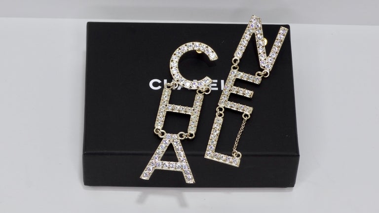 Crystal CHA-NEL Logo Runway Drop Earrings at 1stDibs | cha nel earrings,  cha nel dangle earrings, chanel cha nel earrings