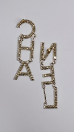Crystal CHA-NEL Logo Runway Drop Earrings at 1stDibs | cha nel chanel  earrings, chanel earrings cha nel