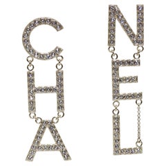 Crystal CHA-NEL Logo Runway Drop Earrings