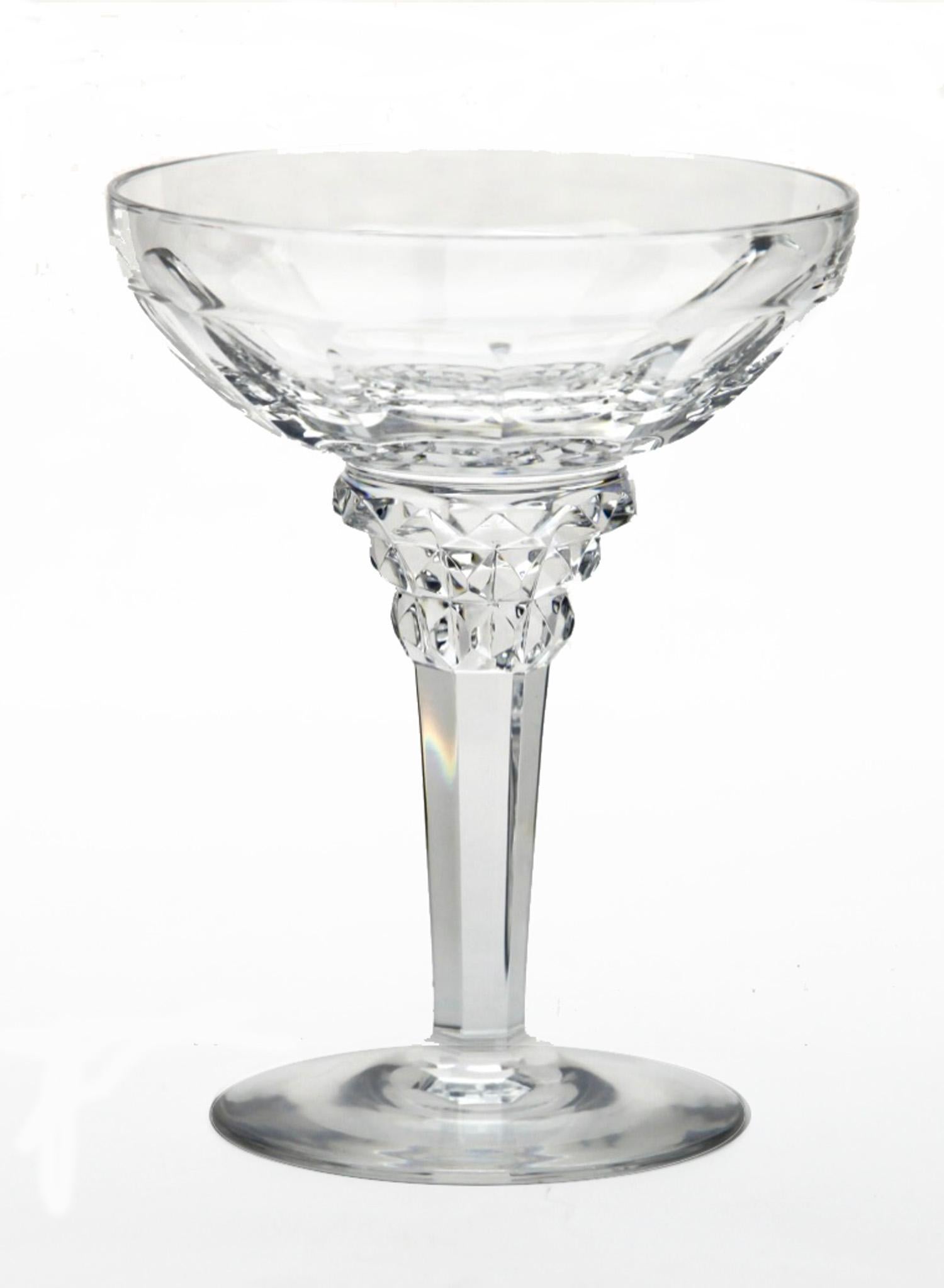 This beautiful set of six champagne coupes were designed by Jan Eisenloeffel for Kristalunie Maastricht in 1928 and have since become the most highly treasured examples of Dutch crystal glass from the Art Deco period. Each one is made by master