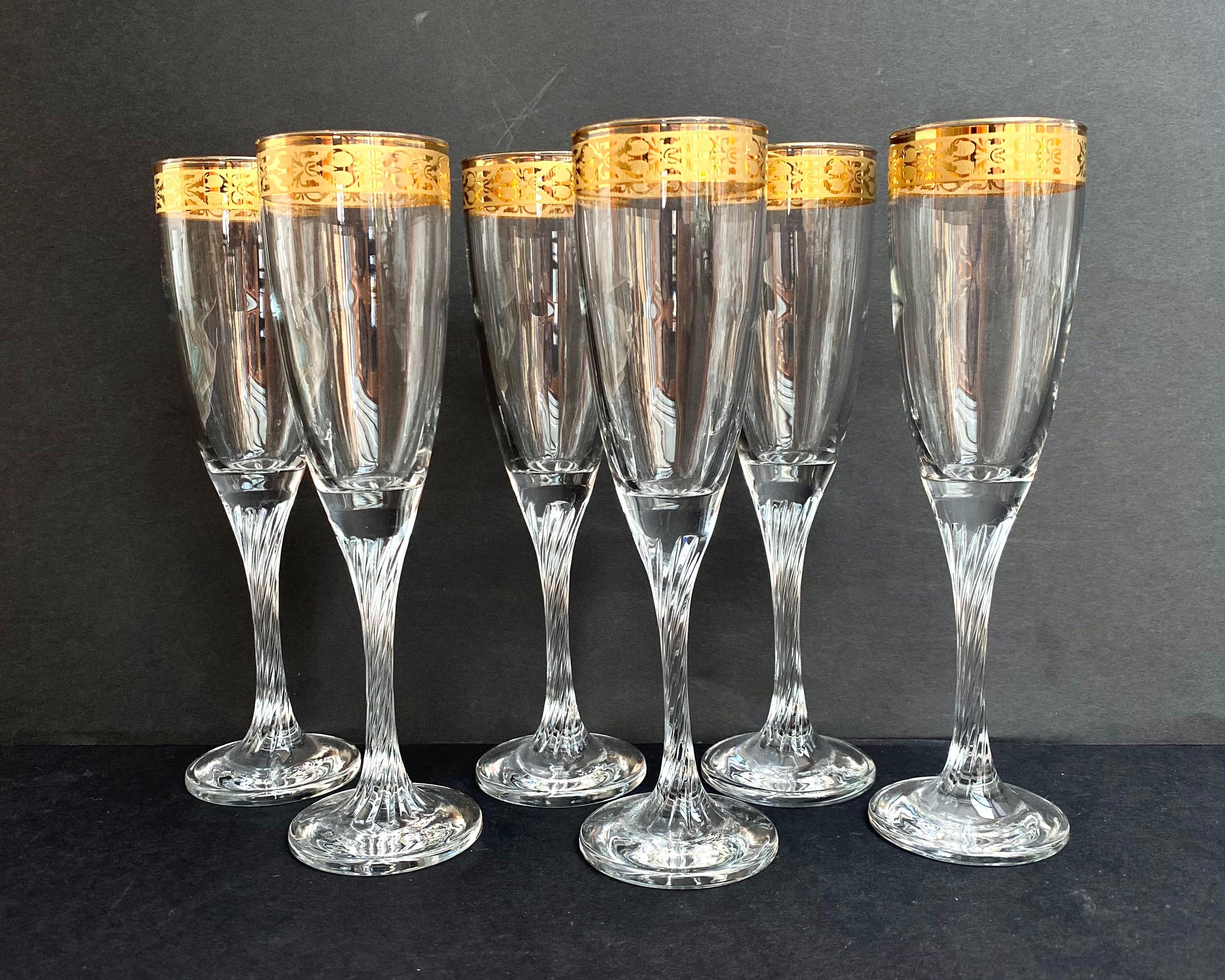 Stunning set of 6 crystal glasses with gold rim. Manufactured in Germany, 1970s.

The set consists of six vintage glasses made of durable crystal.

The products are equipped with high legs. Glasses are designed for serving champagne or other