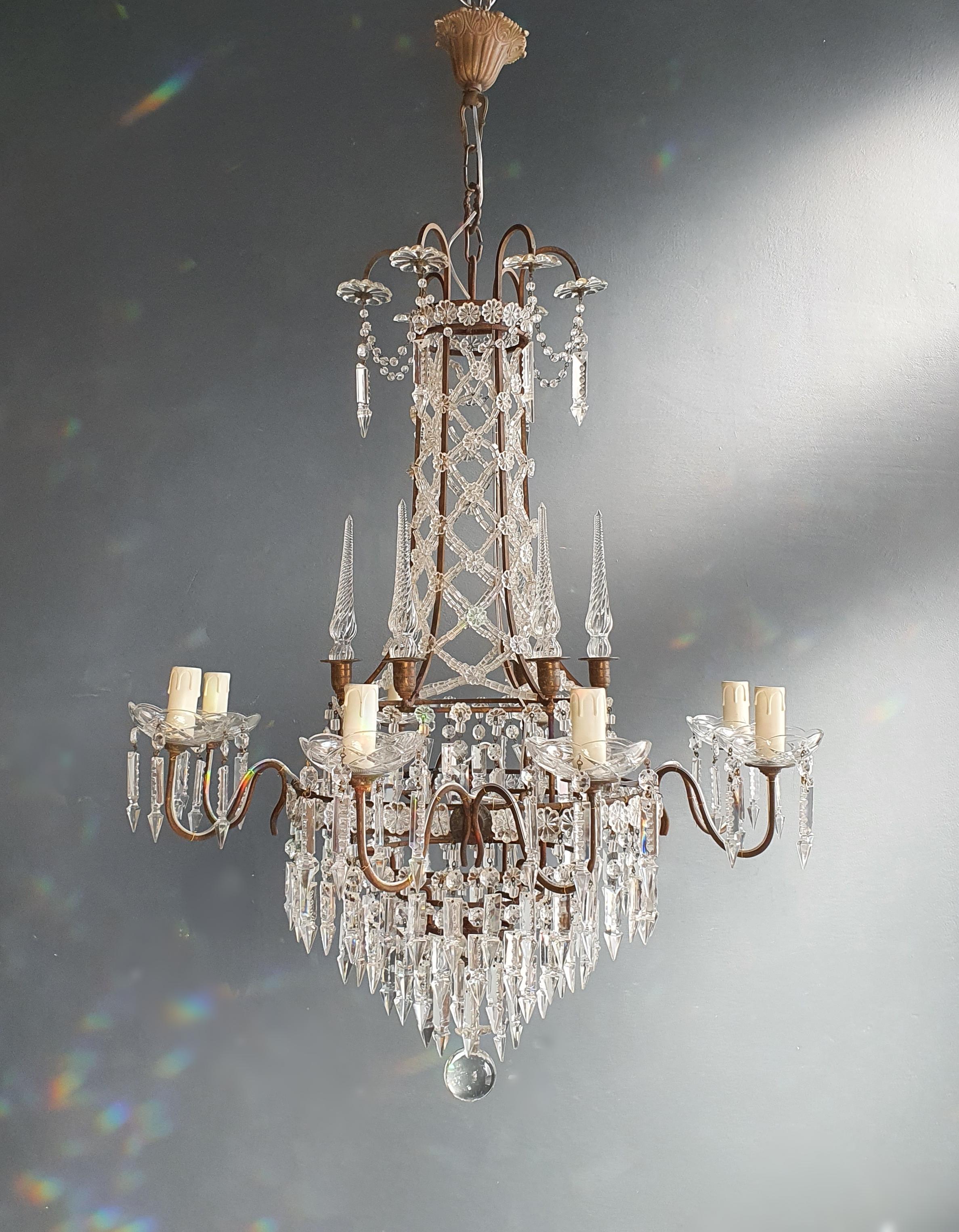 old chandelier with love and professionally restored in Berlin. electrical wiring works in the US. Re-wired and ready to hang. not one missing. Cabling completely renewed. Crystal, hand-knotted.

Measure: Total height 110 cm, height without chain 85