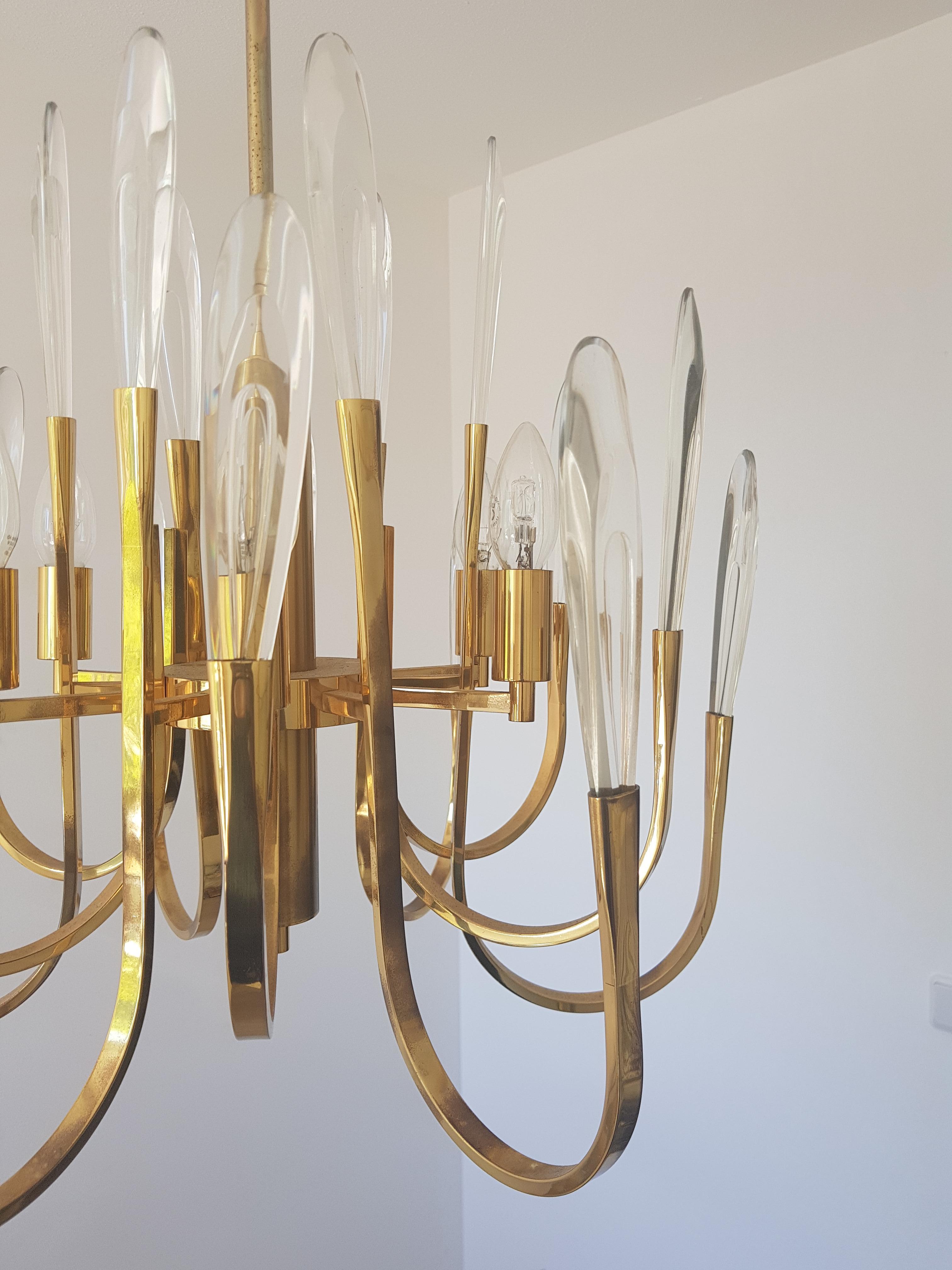 Brass and crystal chandelier, 1970s by Gaetano Sciolari, Hollywood Regency style
Gaetano Sciolari design is a must have for each living room, if you look on the site you will see why. this model is unique, it has brass overal with the crystals it