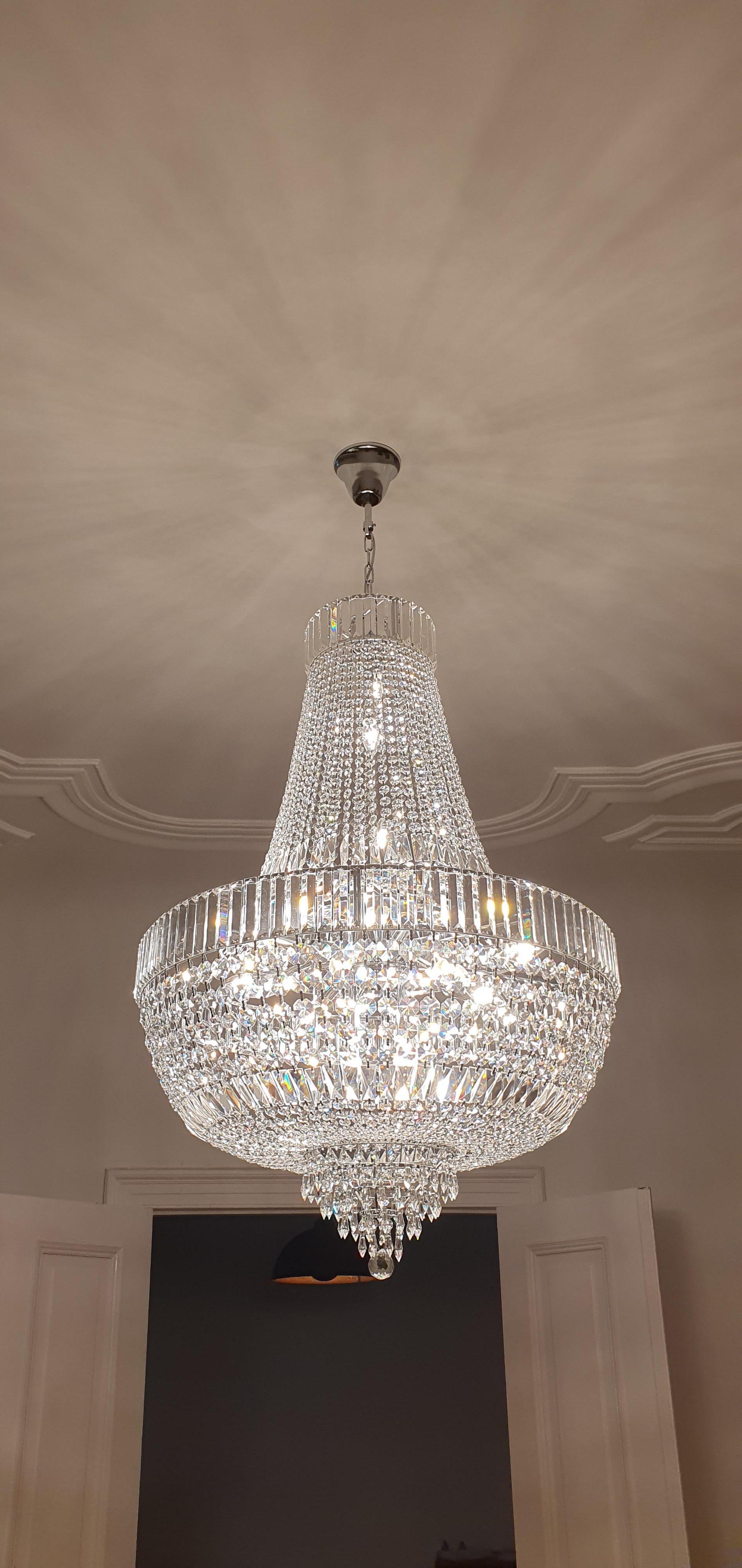 New Art Deco crystal style chandelier Empire style. Asfour crystal.
- House production.
- 55”height x 30”diameter.
- Nickel Plated.
- UL Electrification
- Shipping to: New York.
 