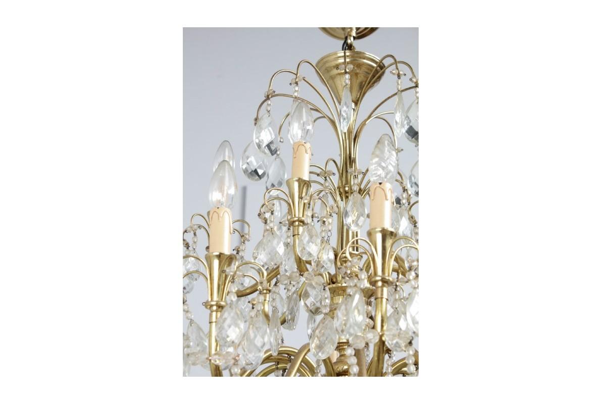 Chandelier from the early 20th century in the style of Louis XV. Year: circa 1910. Origin: France.