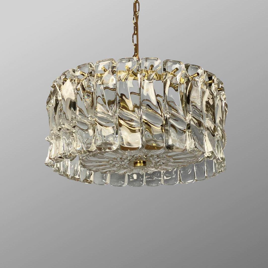 Vintage Venini Crystal Chandelier.

For more than a century, the best master glassmakers have met at the Fornace (Kiln) founded by Paolo Venini, giving life to a legend of excellence and innovation that started in Italy but later spread all over the