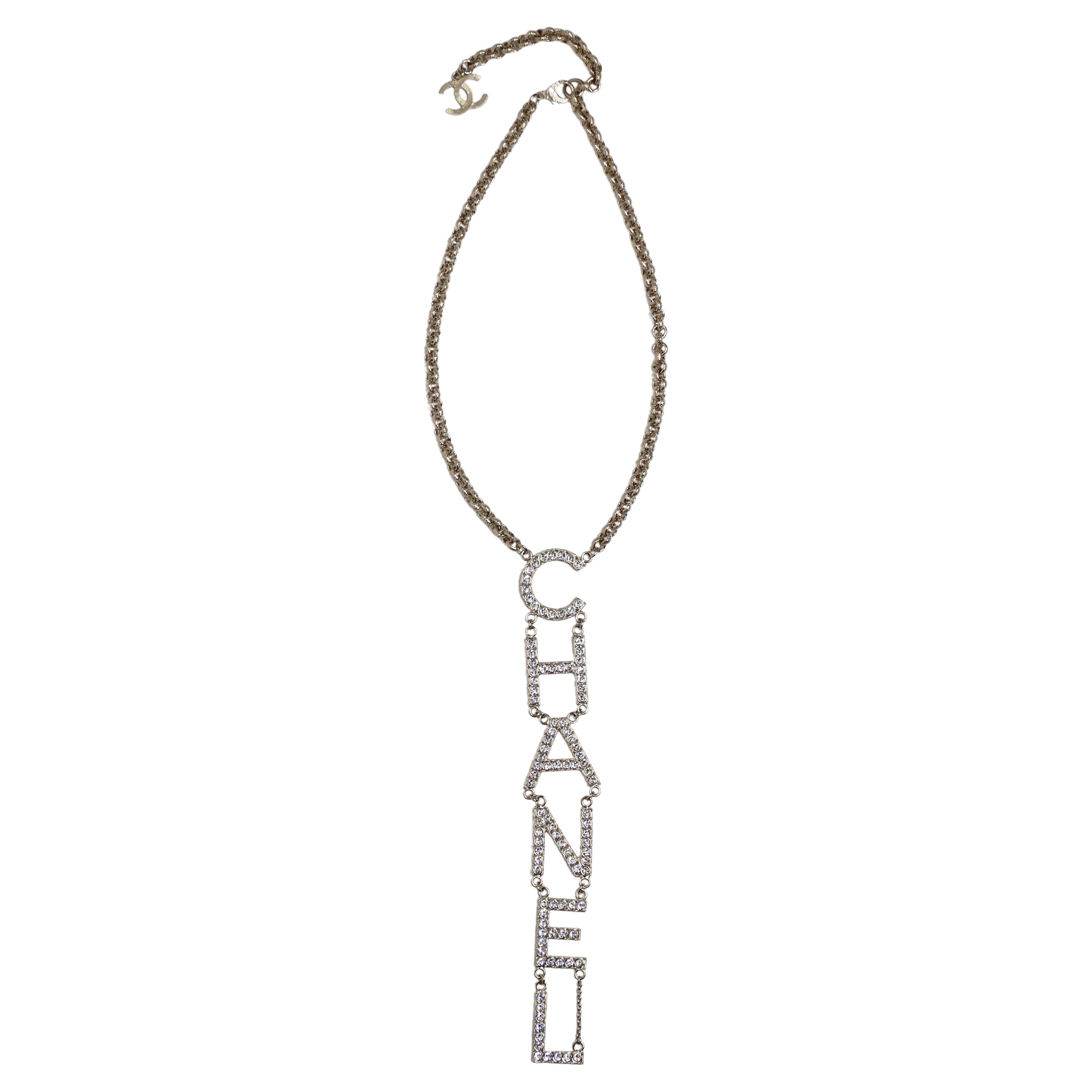 Crystal CHANEL Logo Runway Drop Necklace at 1stDibs  chanel letter  necklace, chanel letters necklace, chanel letter crystal dangle earrings