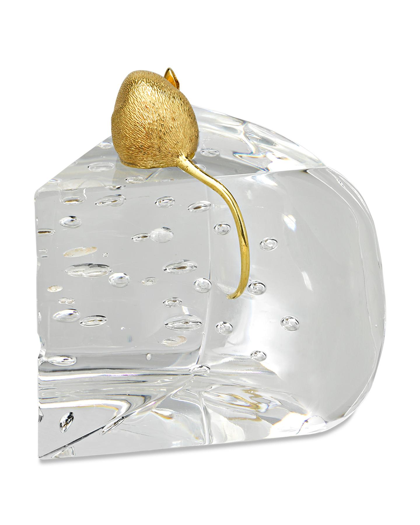 Depicting a mouse atop a slice of cheese, this charming crystal creation was crafted by the famed American glassmakers Steuben Glass Works. The diminutive objet d'art was designed by the famed Steuben designer James Houston, who brilliantly