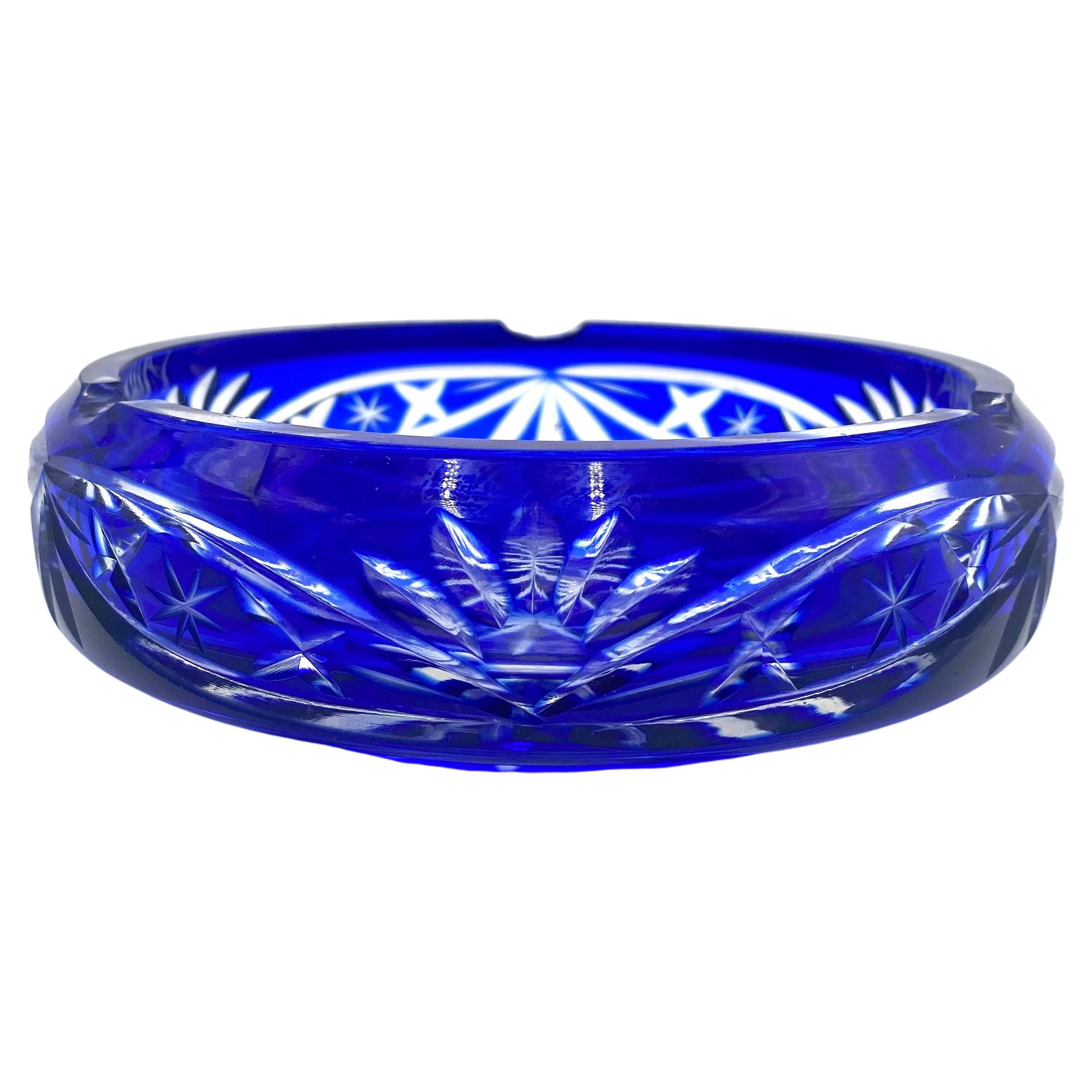 Cobalt colored crystal ashtray

Made in Poland in the 1960s.

Very good condition

Measures: height 5.5 cm, diameter 16 cm.