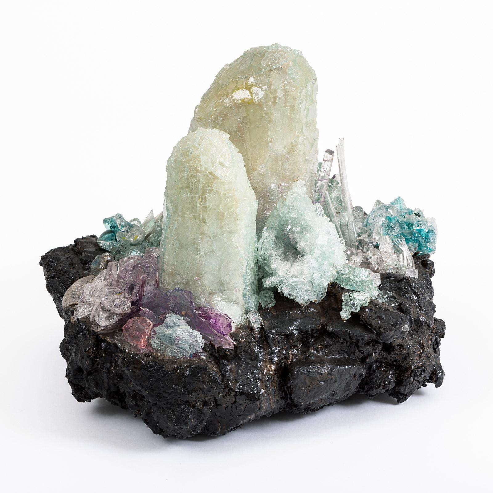 The candy floss colors of minerals sometimes make us forget the violence and force that Mother Nature uses to create them. We have used resins and glass in a very free, artistic way to represent this explosion of beauty. They come, as in nature, in