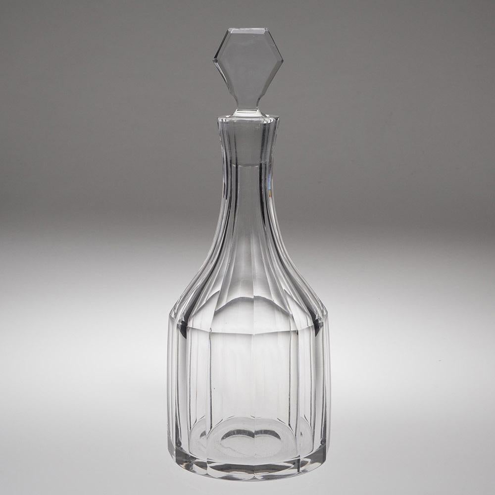 Heading :  Brierley crystal decanter designed by Keith Murray
Date : 1934-39
Period : George V
Origin : England
Colour : Clear
Stopper : Faceted
Neck : Tapered slice cut
Body : Slice cut
Base : Polished – Acid Etched Keith Murray SW Brierley –
Glass