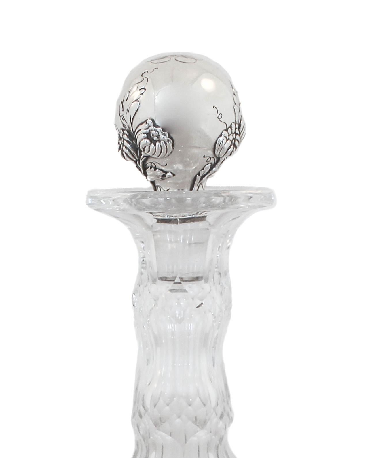 We are happy to offer you this crystal decanter with a sterling silver stopper. The crystal was made by the Hawkes Glass Company and the stopper by Theodore Starr Silver. Two amazing makers collaborated on this piece. Imagine how beautiful it will