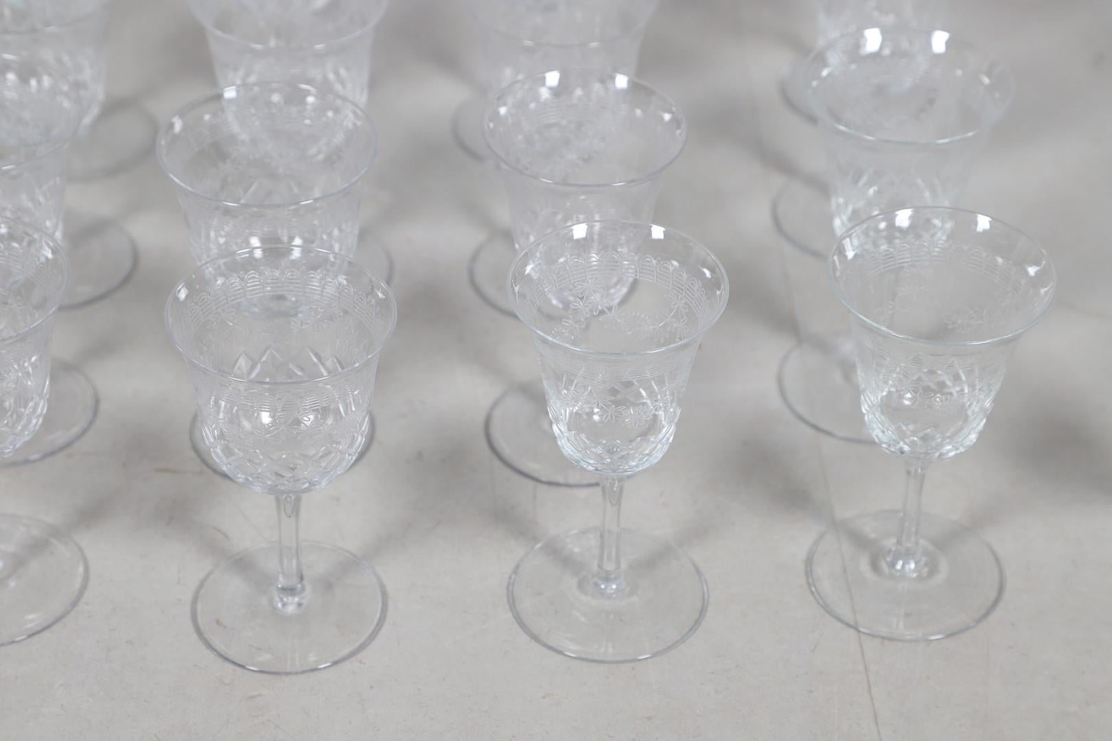 A large set of Antique Italian Crystal Claret Jug Decorative Glass Pitcher Circa 1880s total of 45 objects.
Antique Cut Glass Table Suite – Decanters and Stemware, Etched & Faceted Design

A fine and decorative suite of cut and etched glass