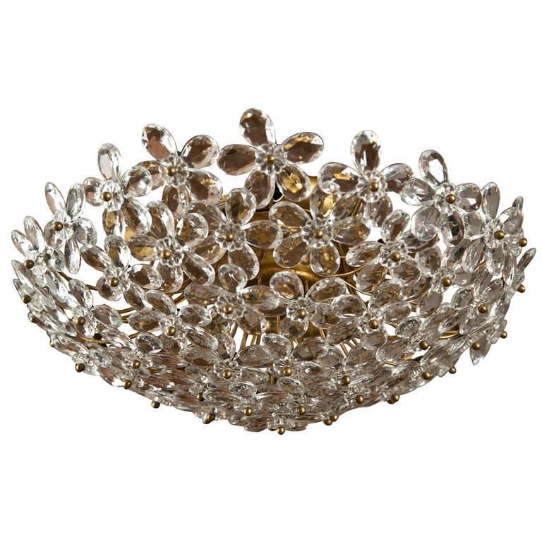 Lovely artisan composed crystal faceted floral dome-shape ceiling light, illuminated with five UL approved brass candelabra sockets and
Sold as install ready at 11-12? OAH and electrified to code with UL approved parts. Additional to UL