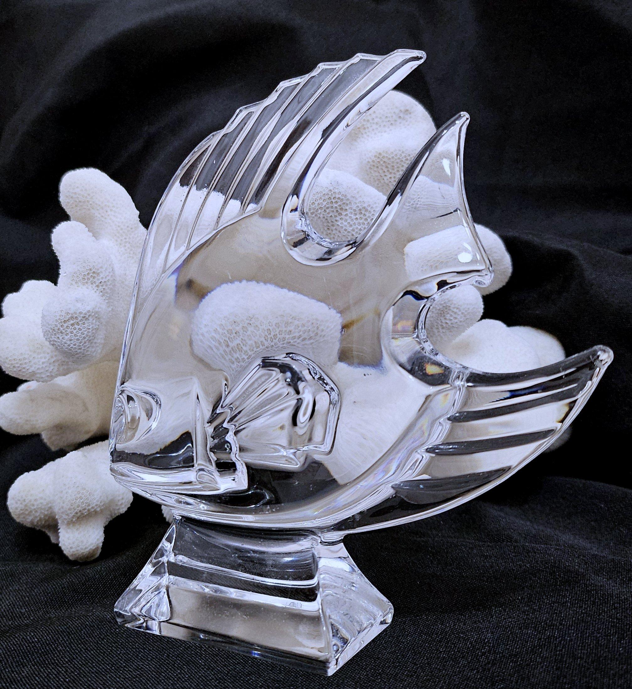 Crystal Fish Sculpture - vintage.  A dynamic piece, in our opinion.
Good vintage condition. A simple cleaning would make it really shine.
Apx 5 x 5 inches.
NOTE: The piece of coral in the background is not included. It is available seperately,