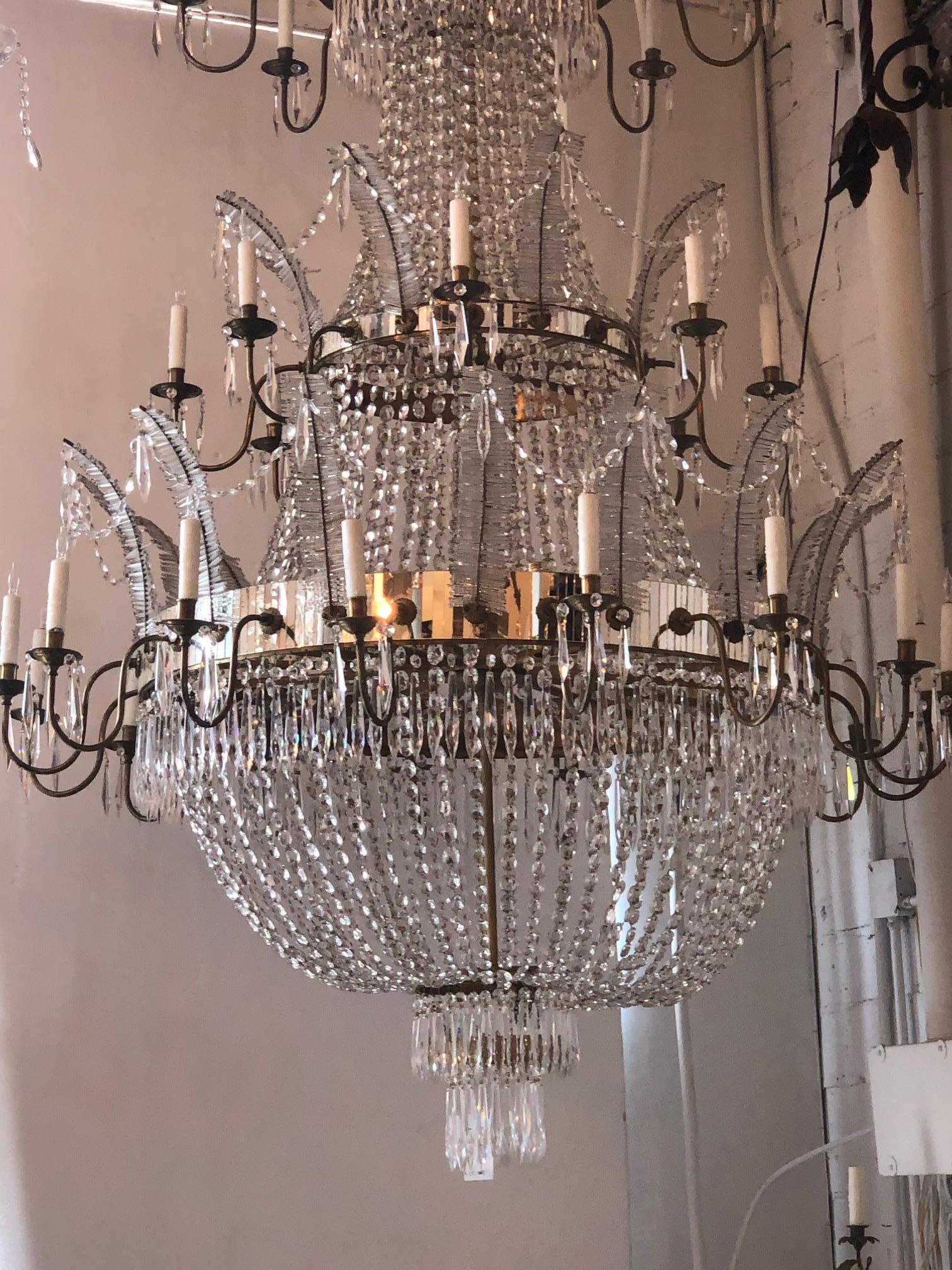 Large entry crystal chandelier, 30 lights with an unique and incredible design from the early 19th century.
Certified and ready to install.