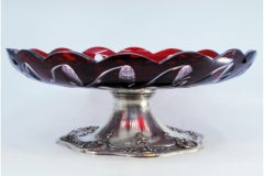 Crystal fruit bowl on silver base with shells, garlands & florals