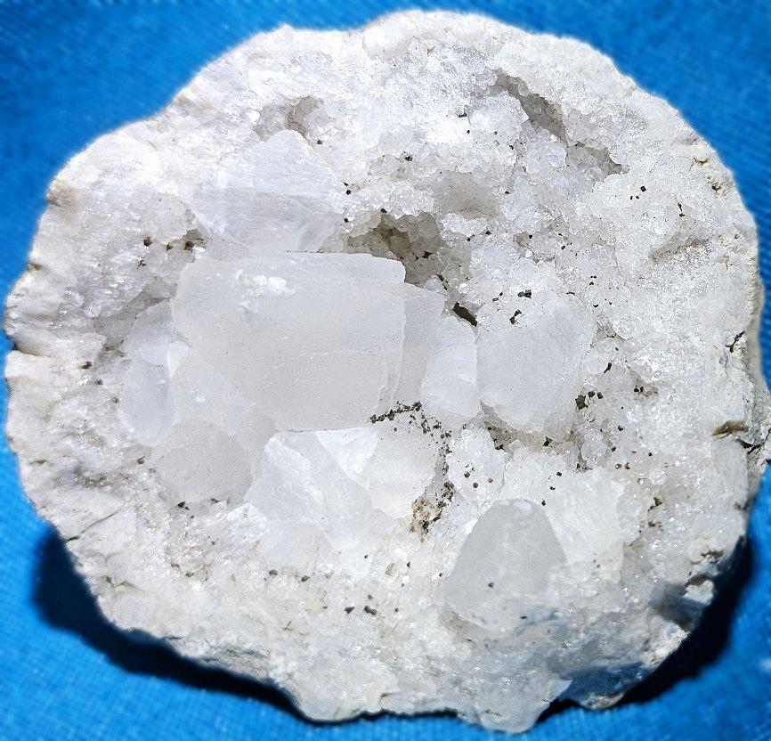 Crystal Geode Natural Specimen with Druzy & Chunks
UPDATE: Due to agreement with 1stDibs, we'll be staying through the end of the year.
This unique geode offers crystal chunks in crystal druzy, with tiny black speckles.
It measures approximately 2.5