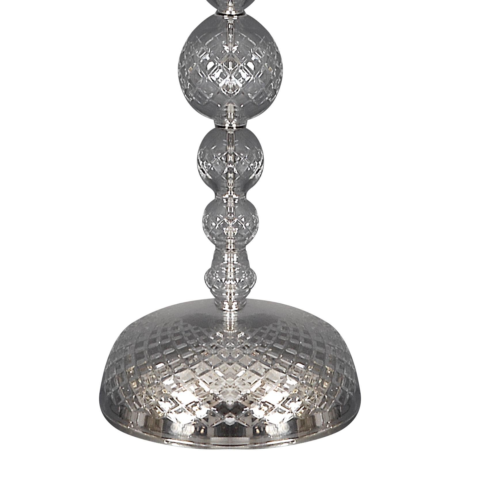 Elaborate and artistic metalwork, with nifty bent brass parts, richly decorated with hand-cut crystal glass, with a column of crystal spheres in several sizes

All components according to the UL regulations, with an additional charge we will