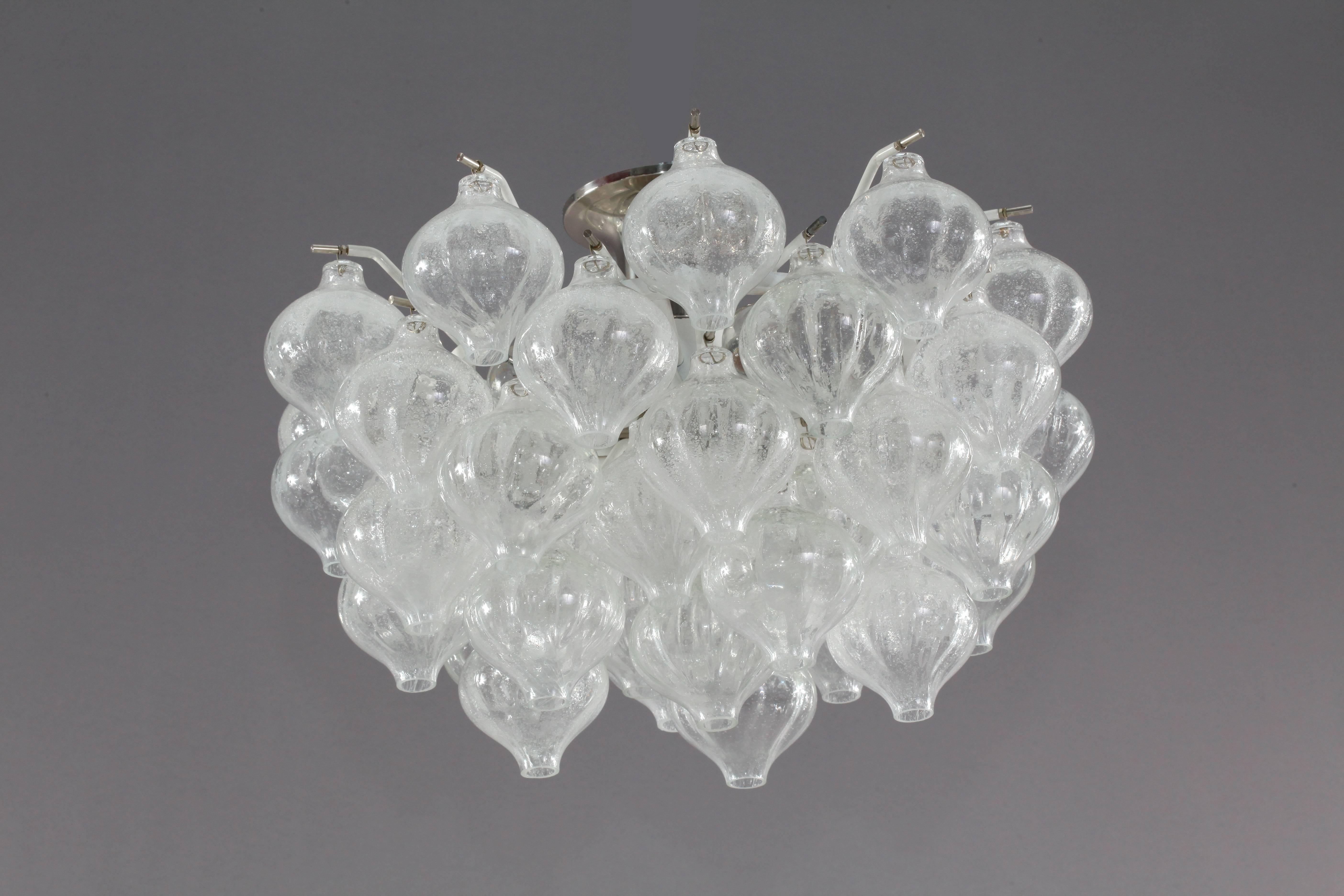 Crystal glass chandelier,
model Tulipan,
designed J.T.Kalmar,
manufactured Kalmar,
Austria, 1960.
Lacquered metal,
crystal glass balls,
12 bulb sockets each max. 40 watt.