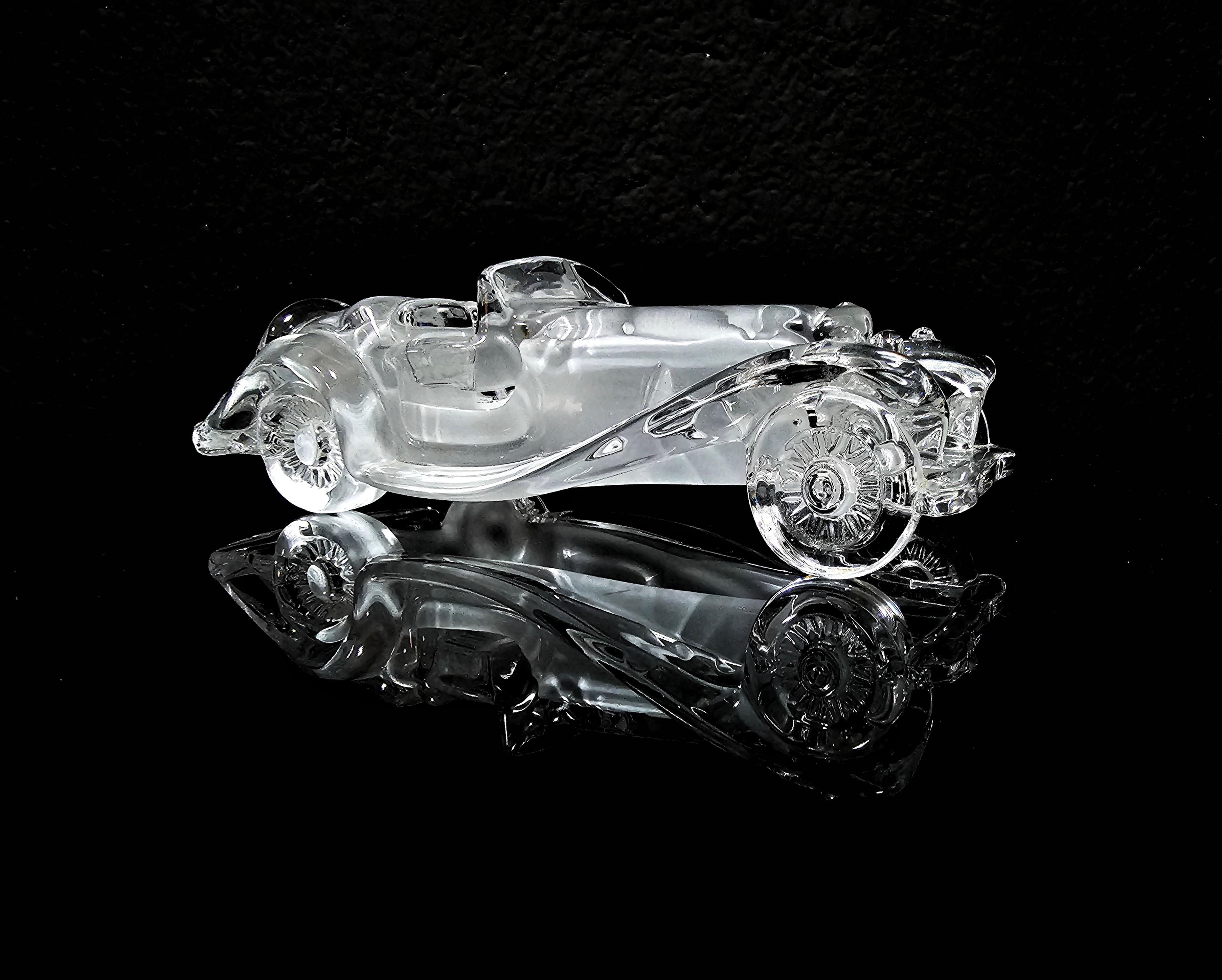 In this listing you will find a Vintage Crystal Glass Figurine of the Bugatti 55 Roadster, manufactured by Daum Glass. Attention to detail is what makes Dum exceptional glass maker. Two same figurines of Bugatti are available, one in clear glass,