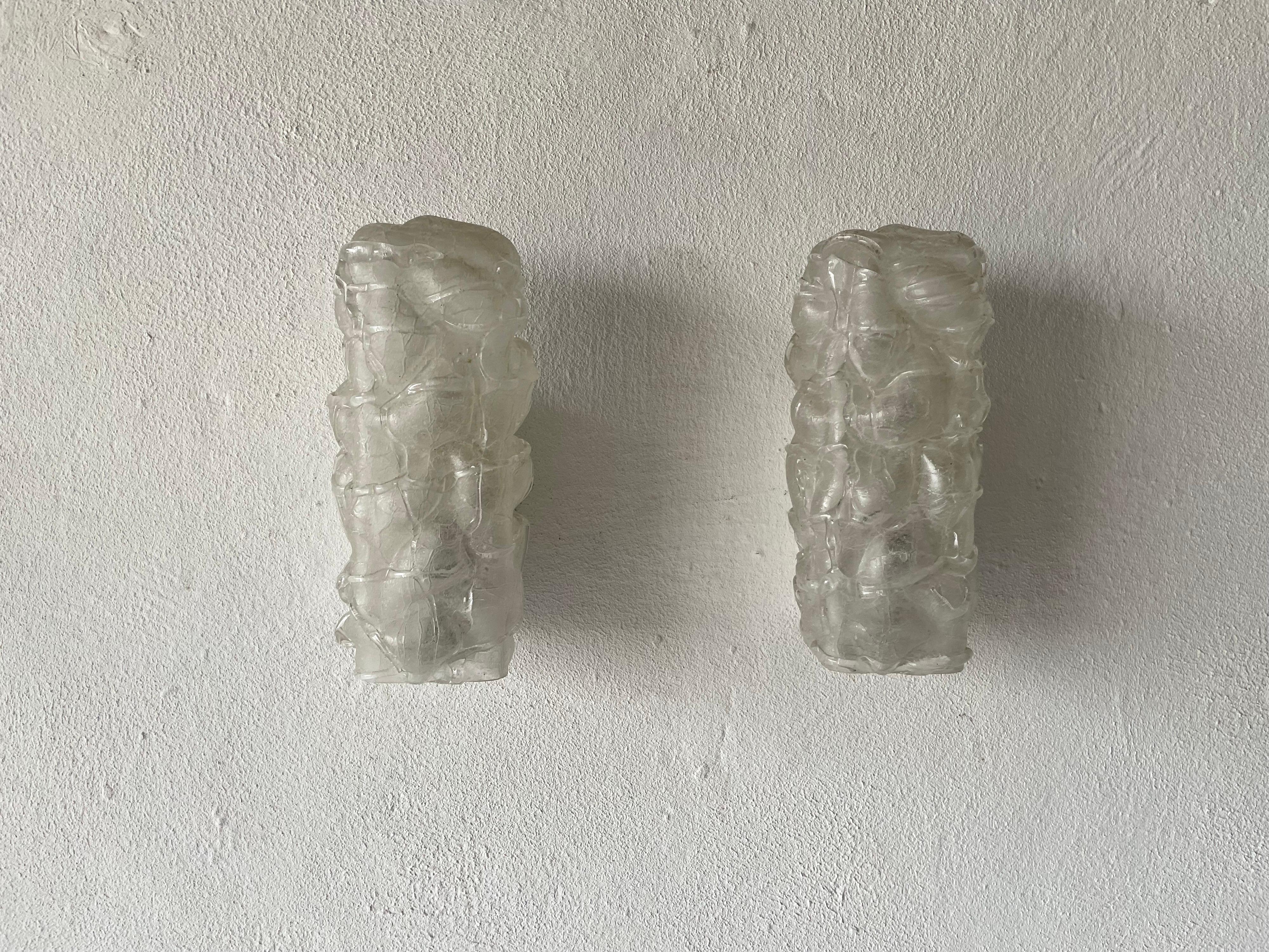 Crystal Glass in exceptional shape pair of rare sconces by Doria, 1960s, Germany

Very elegant and Minimalist wall lamps

Lamps are in very good condition.

These lamps works with E14 standard light bulbs. Each lamp works with 1 light bulb.