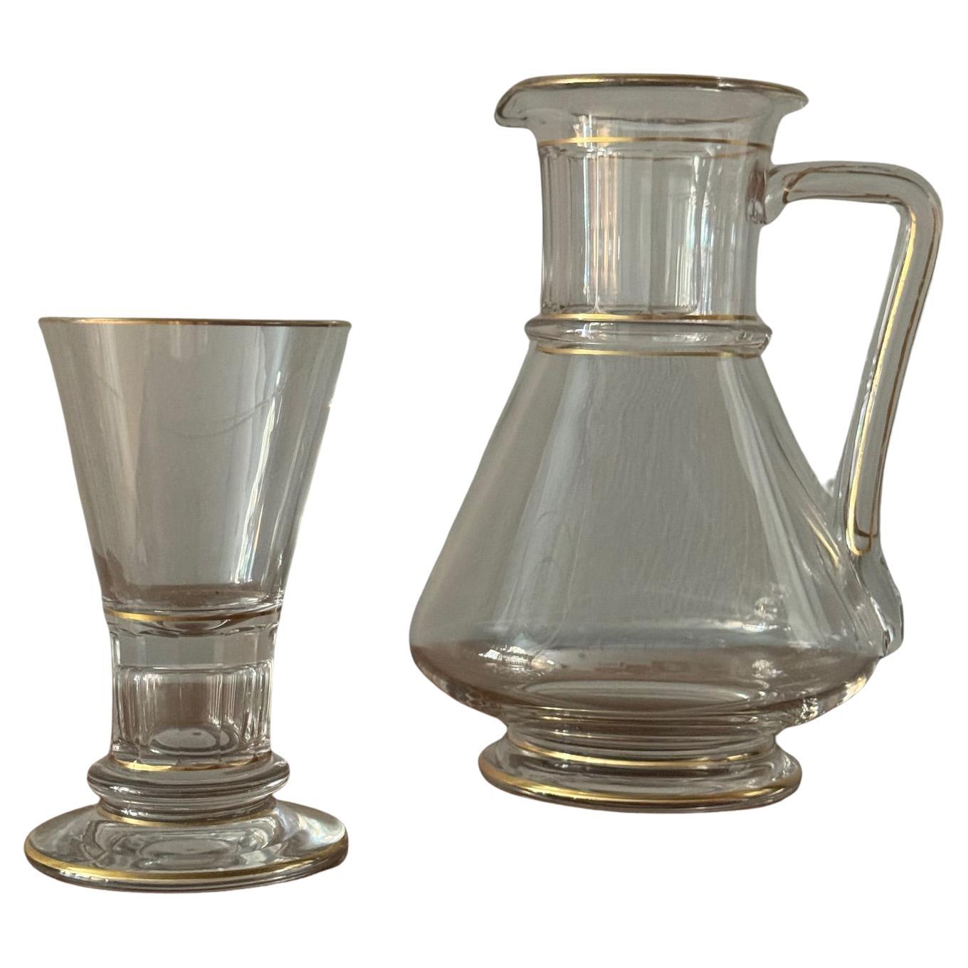 Crystal glass jug and tumblers with gold details by Lobmeyr signed