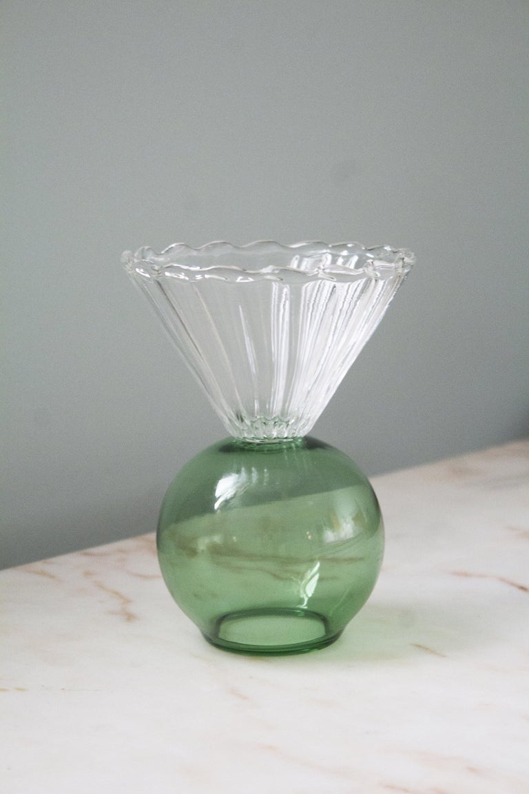 Crystal cup piece elaborated by Italian artisans, available in transparent and green color.
Designed by Natalia Criado as a continuation of her Wonder Crystals project. Composed by colorful vases of different shapes and sizes, these pieces can be