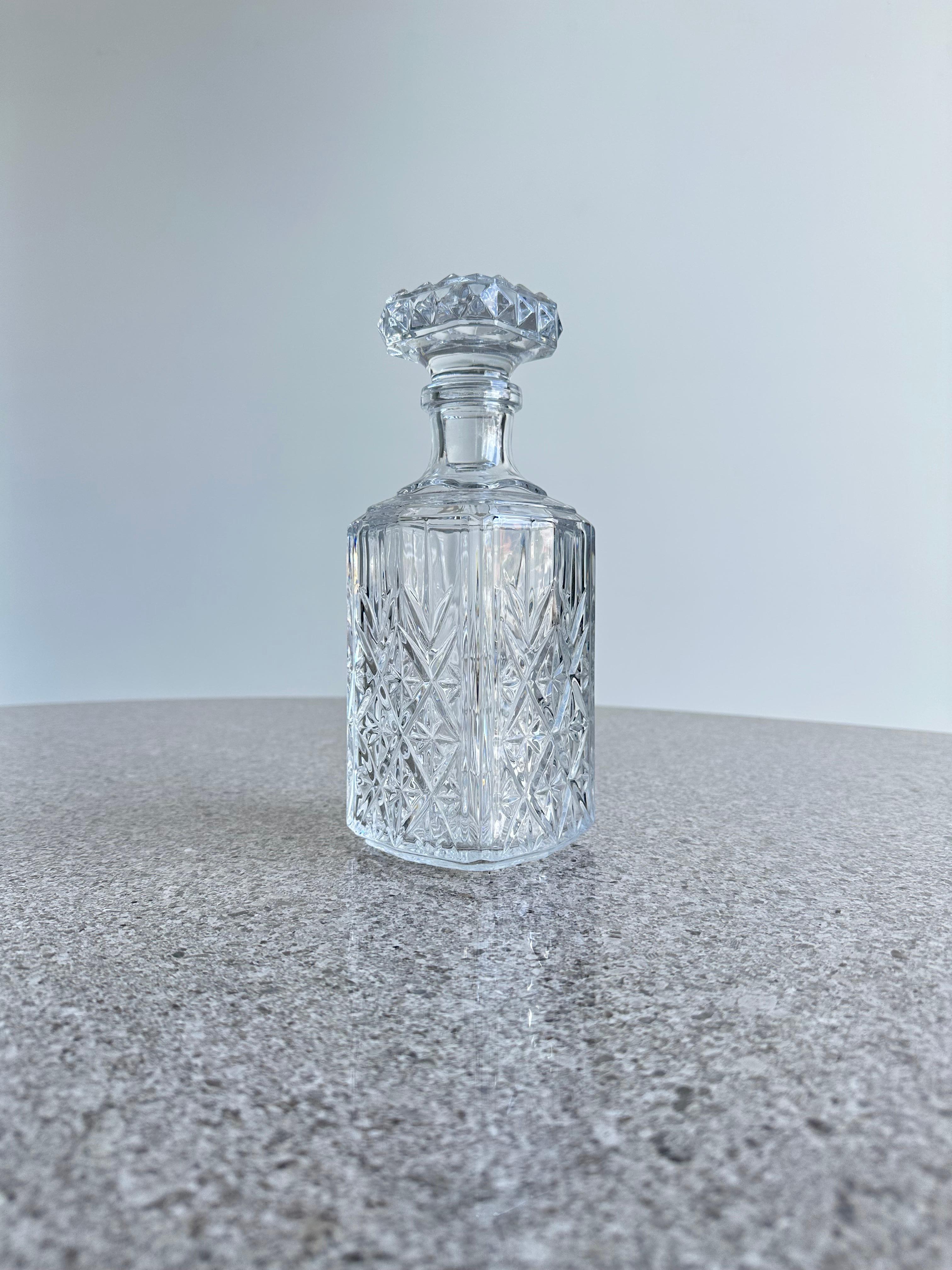 One of a kind Liquor thick crystal bottle. Italian made 1950s.