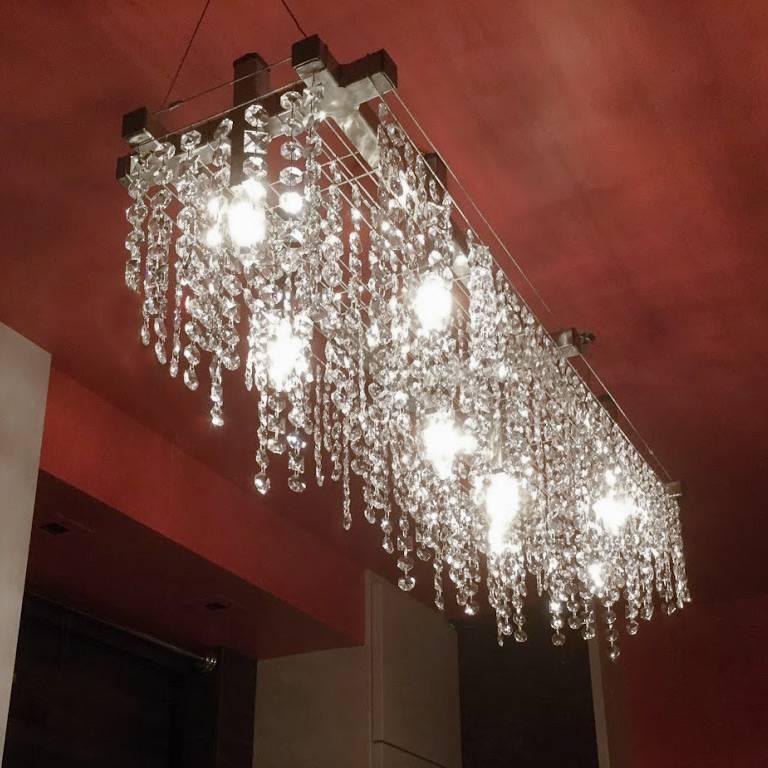 The Matrix Linear Suspension is a light that can change. Featuring eight up-lights and eight down-lights, it is a beautiful modern lighting fixture. It is designed in such a way to be able to carry a wide array of different decorative elements which