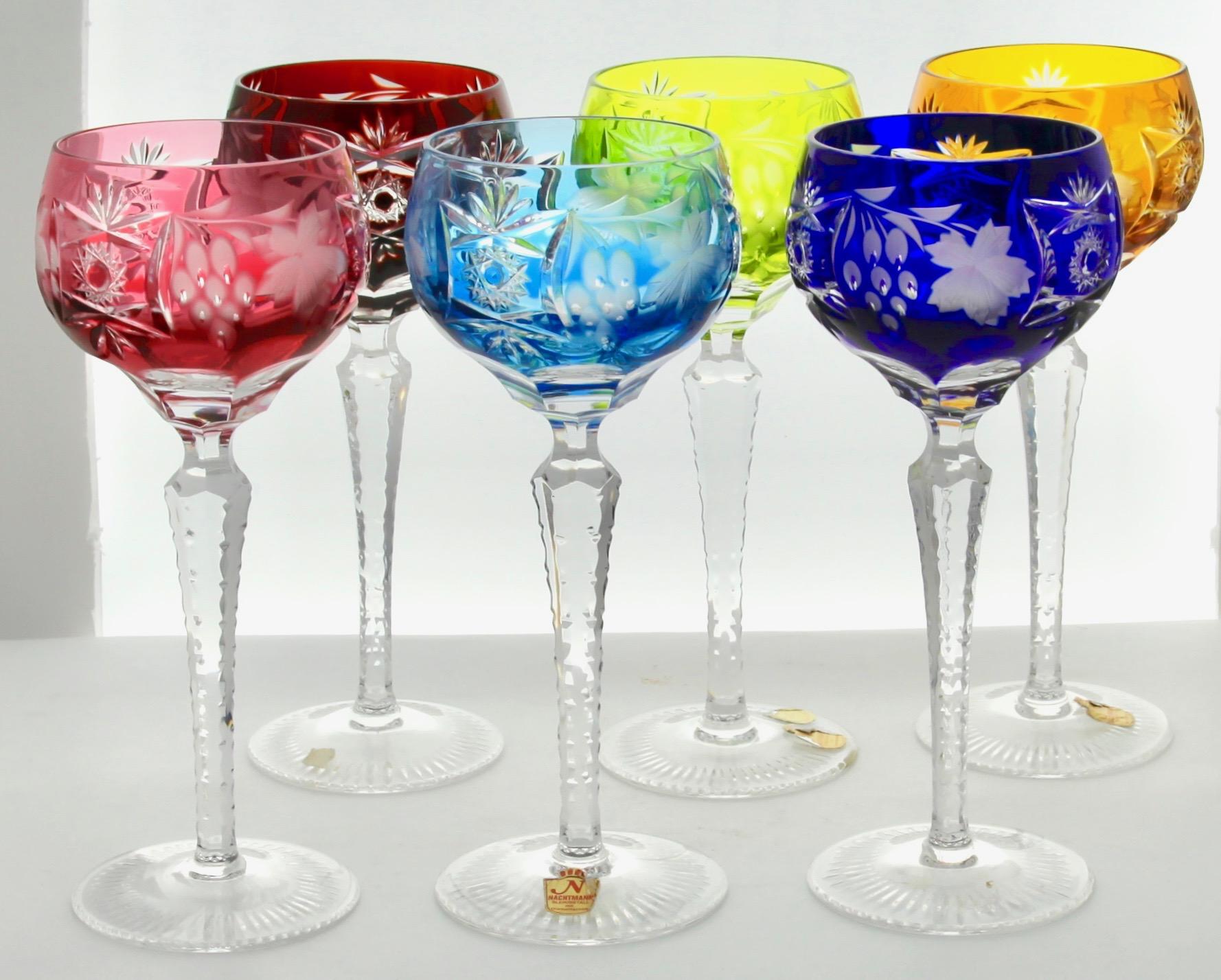 Vintage mix set of 6 cut to clear crystal stem glasses.
Mix crystal (Bleikristall 24% Mundgeblasen Handgeschliffen) glasses

Clear demi crystal glass. Side facetted and toothed stem. The bowl with colored overlay cut to clear.
In best condition.

We